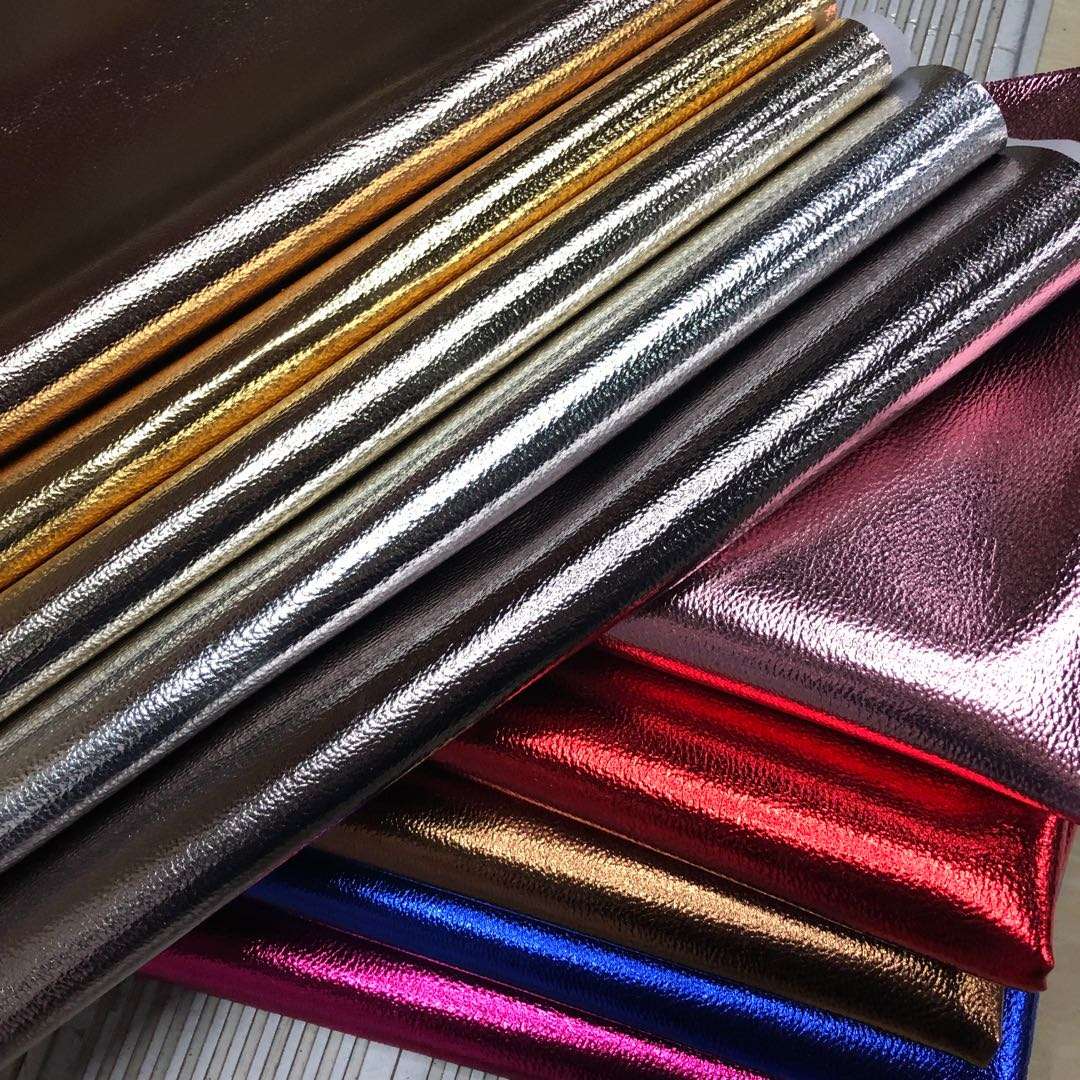 Factory direct sales of new seven-color lychee pattern luggage, leather fabric, film, lychee new European standard, environmentally friendly Item Picture