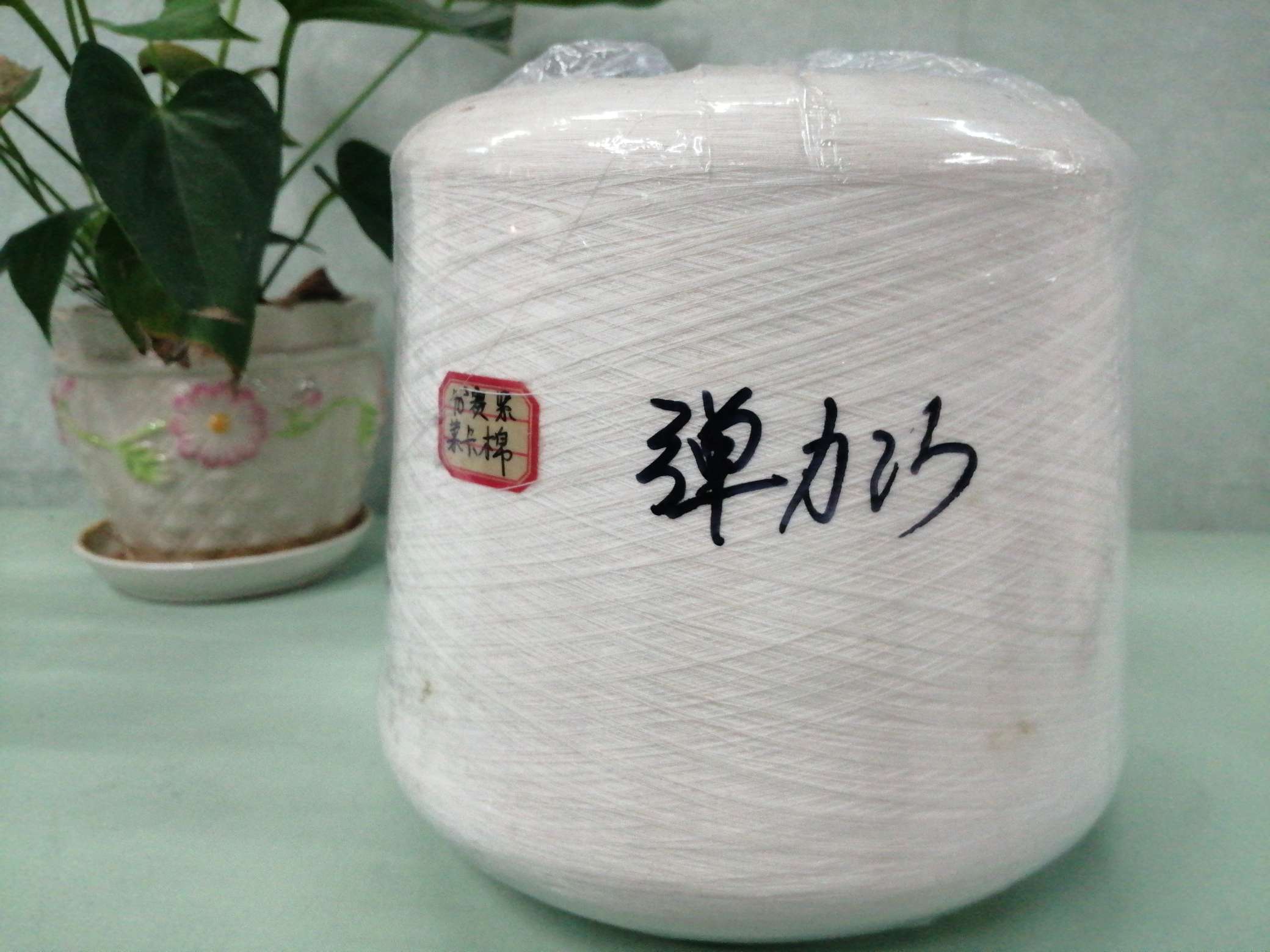 Hao Sheng colored yarn competes with tight-spun stretch yarn