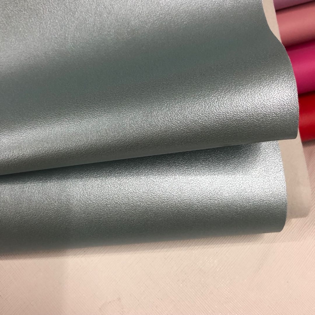 Factory direct sales of eco-friendly calfskin leather fabric pvc bag belt packaging box fabric undefined