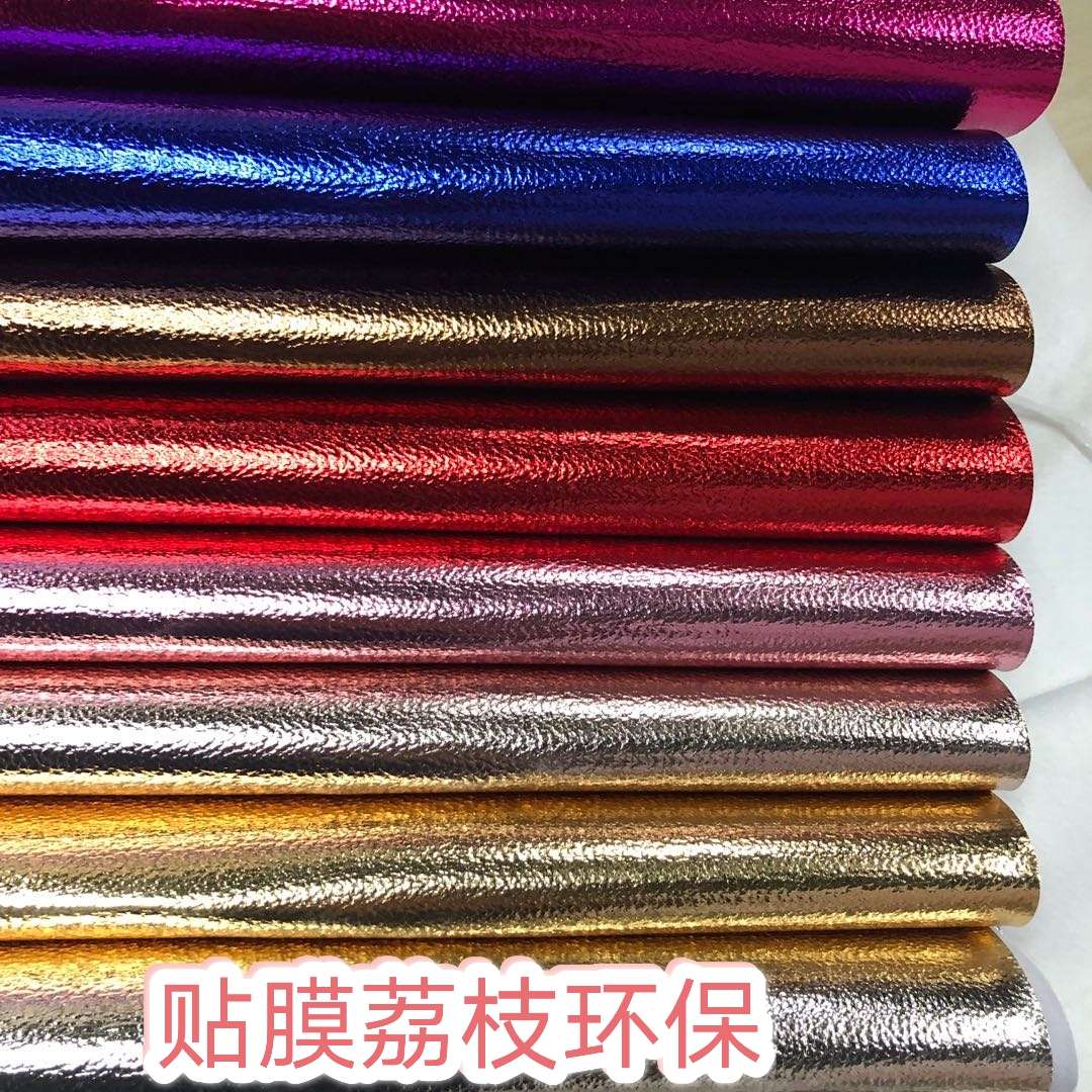 Factory direct sales of new seven-color lychee pattern luggage, leather fabric, film, lychee new European standard, environmentally friendly
