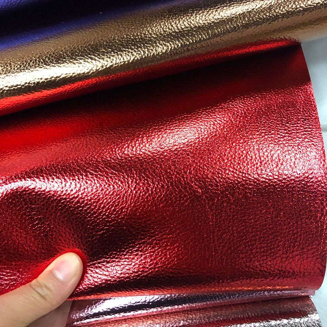Factory direct sales of new seven-color lychee pattern luggage, leather fabric, film, lychee new European standard, environmentally friendly undefined