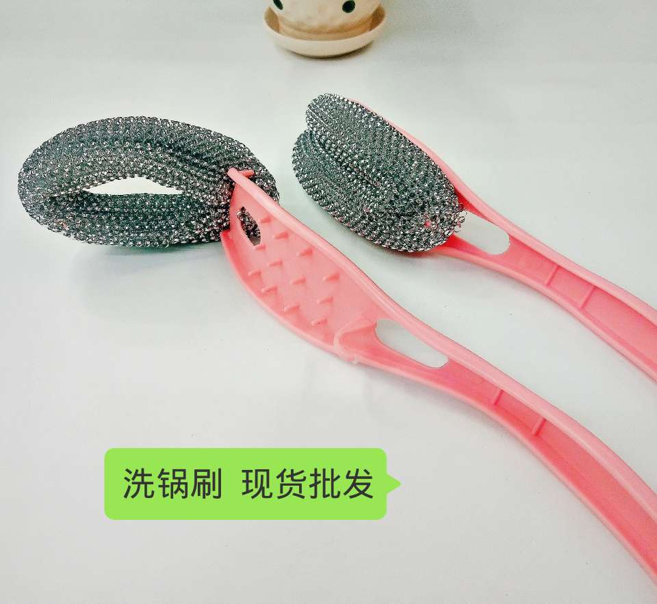 Wash the pot with red brush for efficient cleaning thumbnail