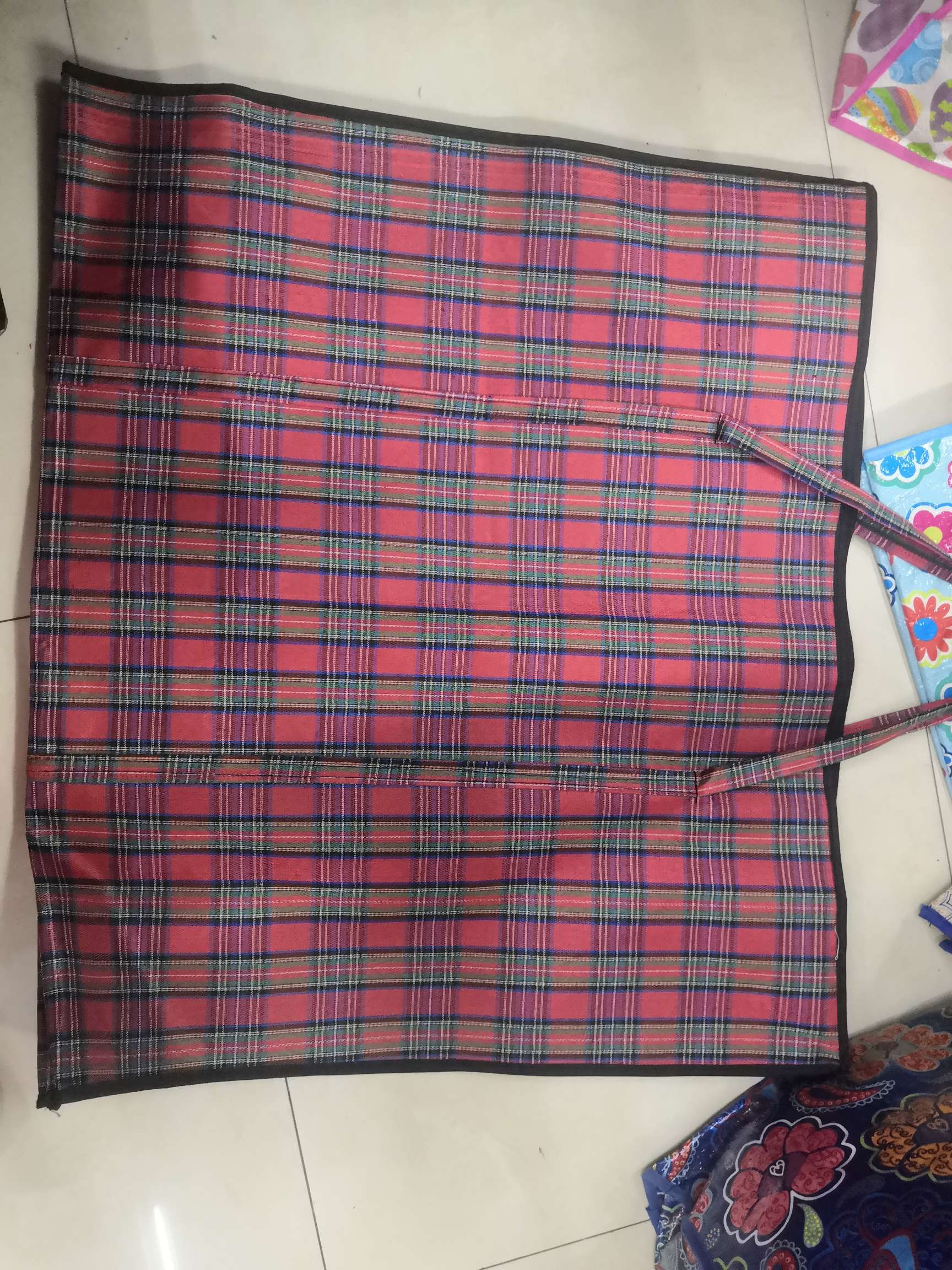 Red-framed woven bag