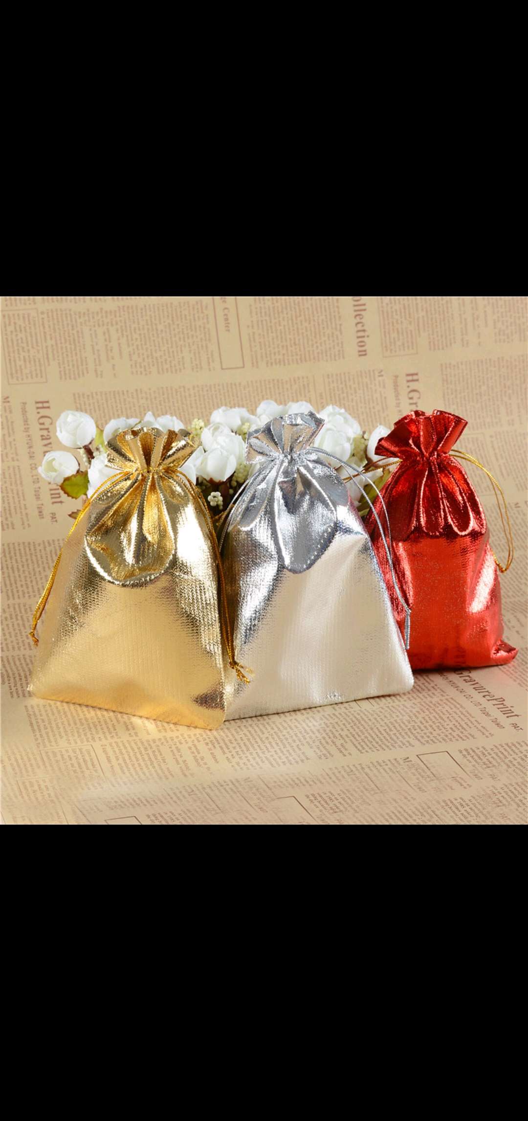 Gold and silver bags, jewelry storage bags