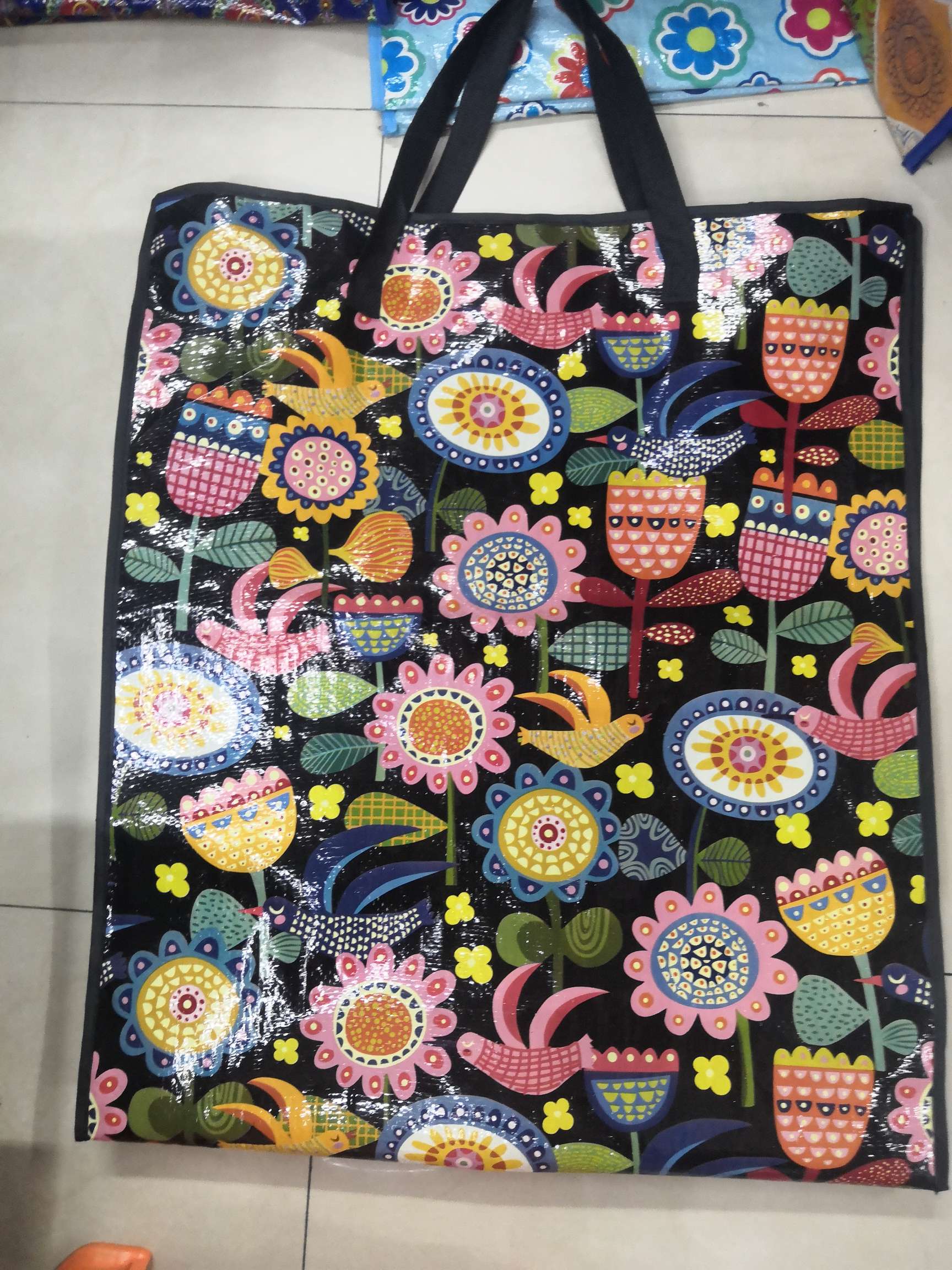Black tropical-style woven bag