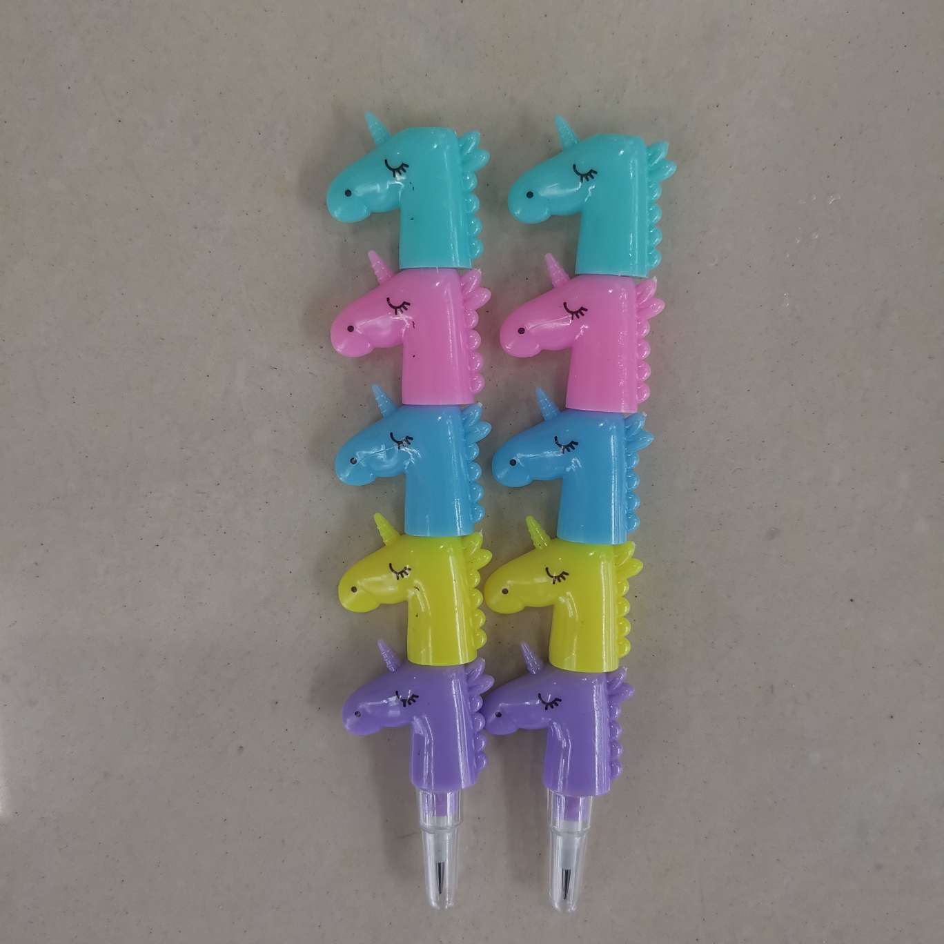 Shaped pencils, crayons, unicorn-shaped pens details Picture