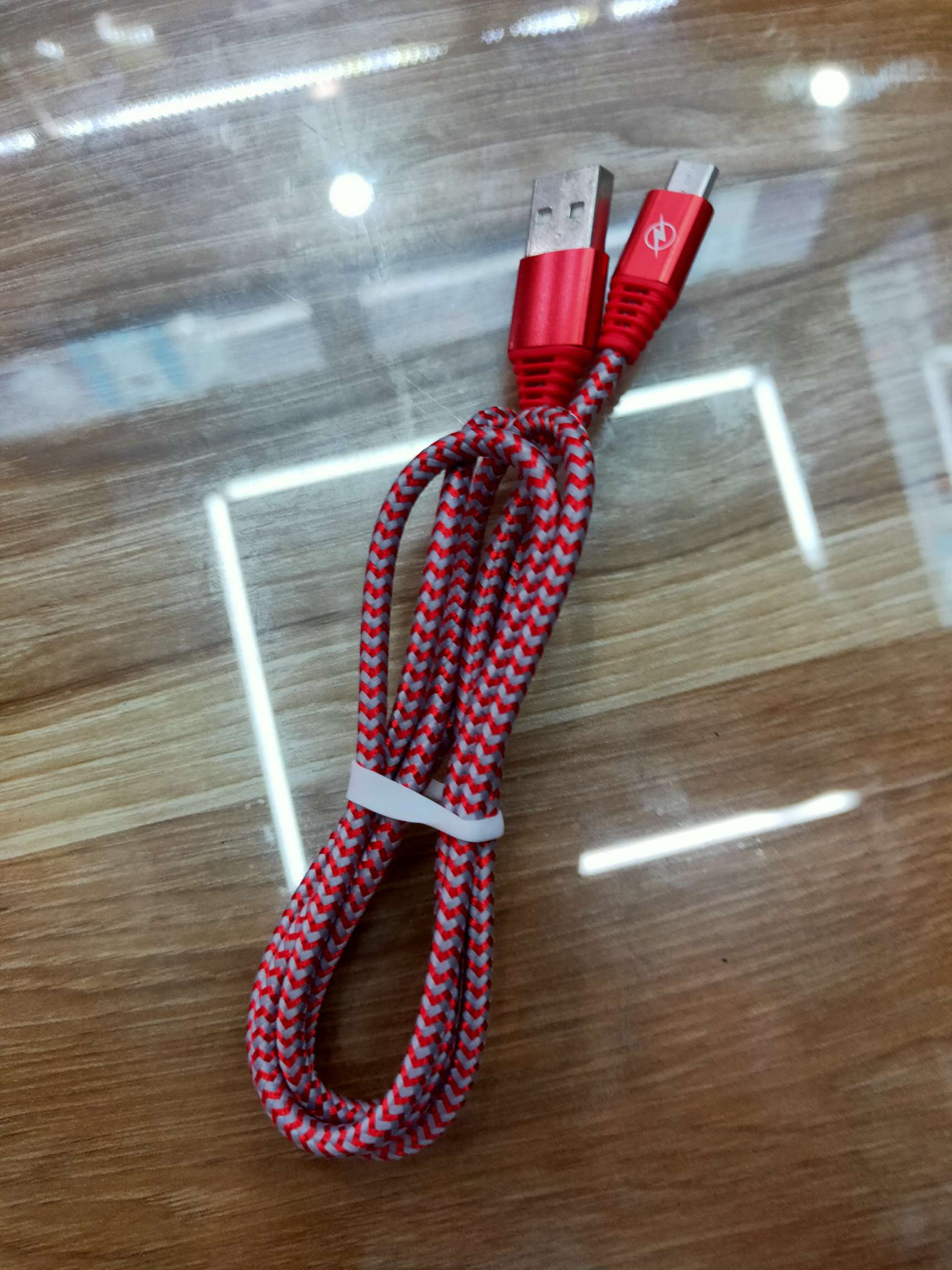 Red and white striped data cable
