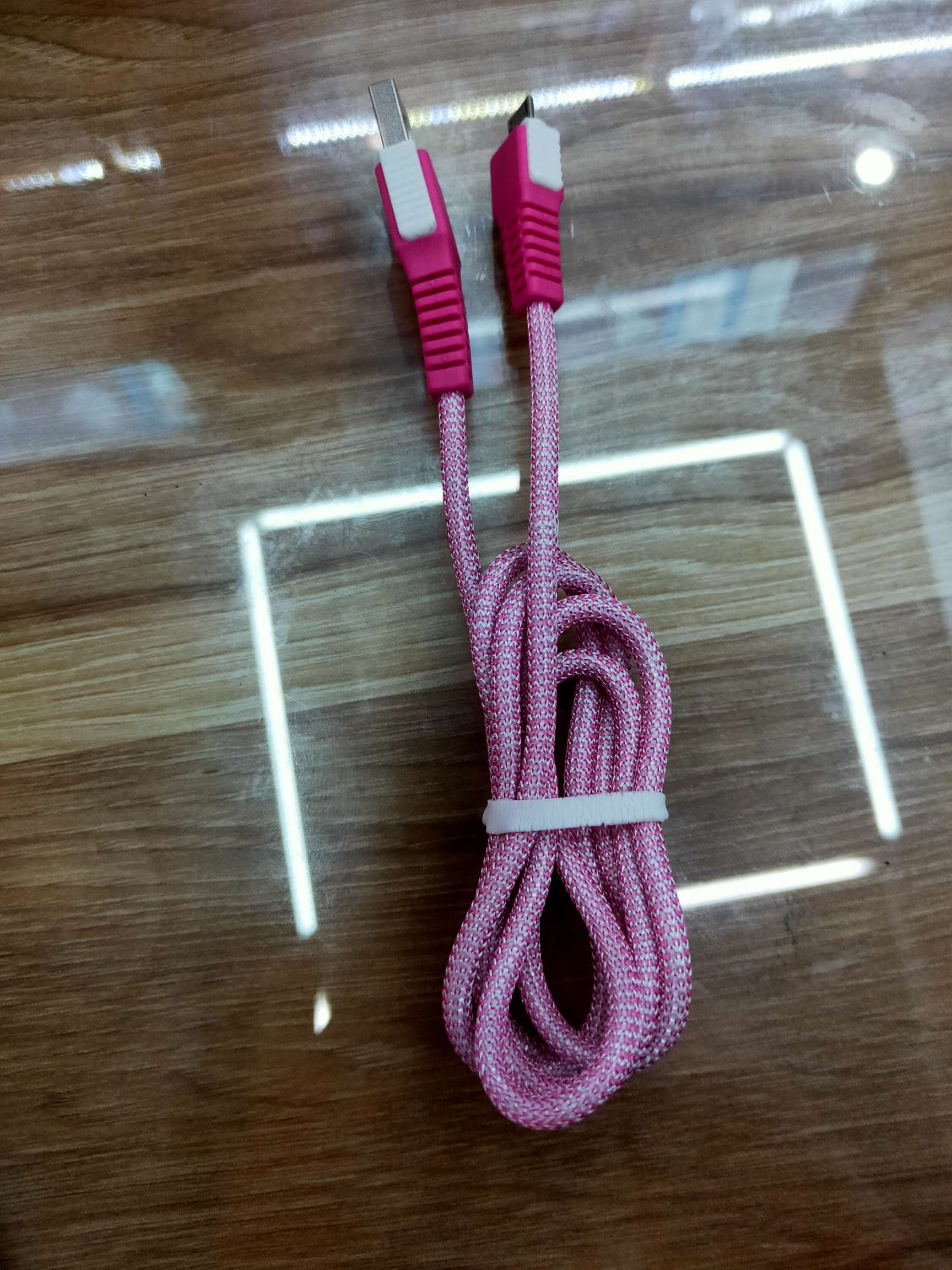 Pink and white data cable