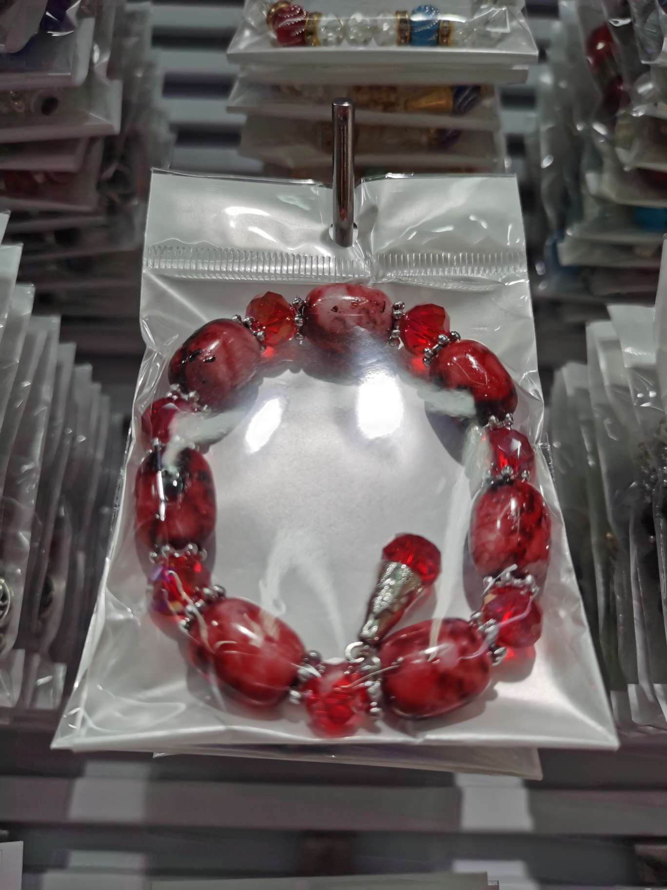 Red with a pendant bracelet