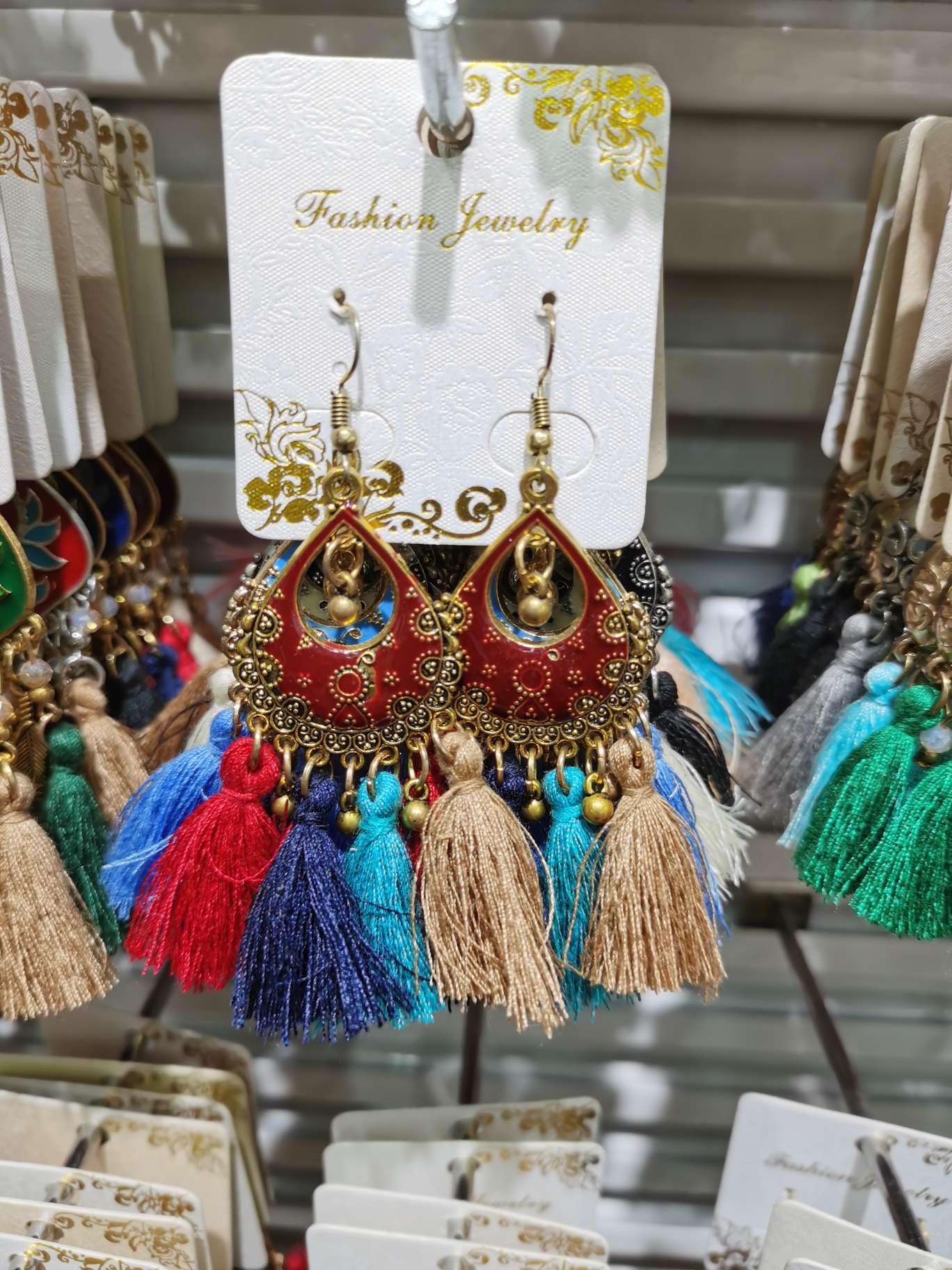 Tassel earrings are a dark mix