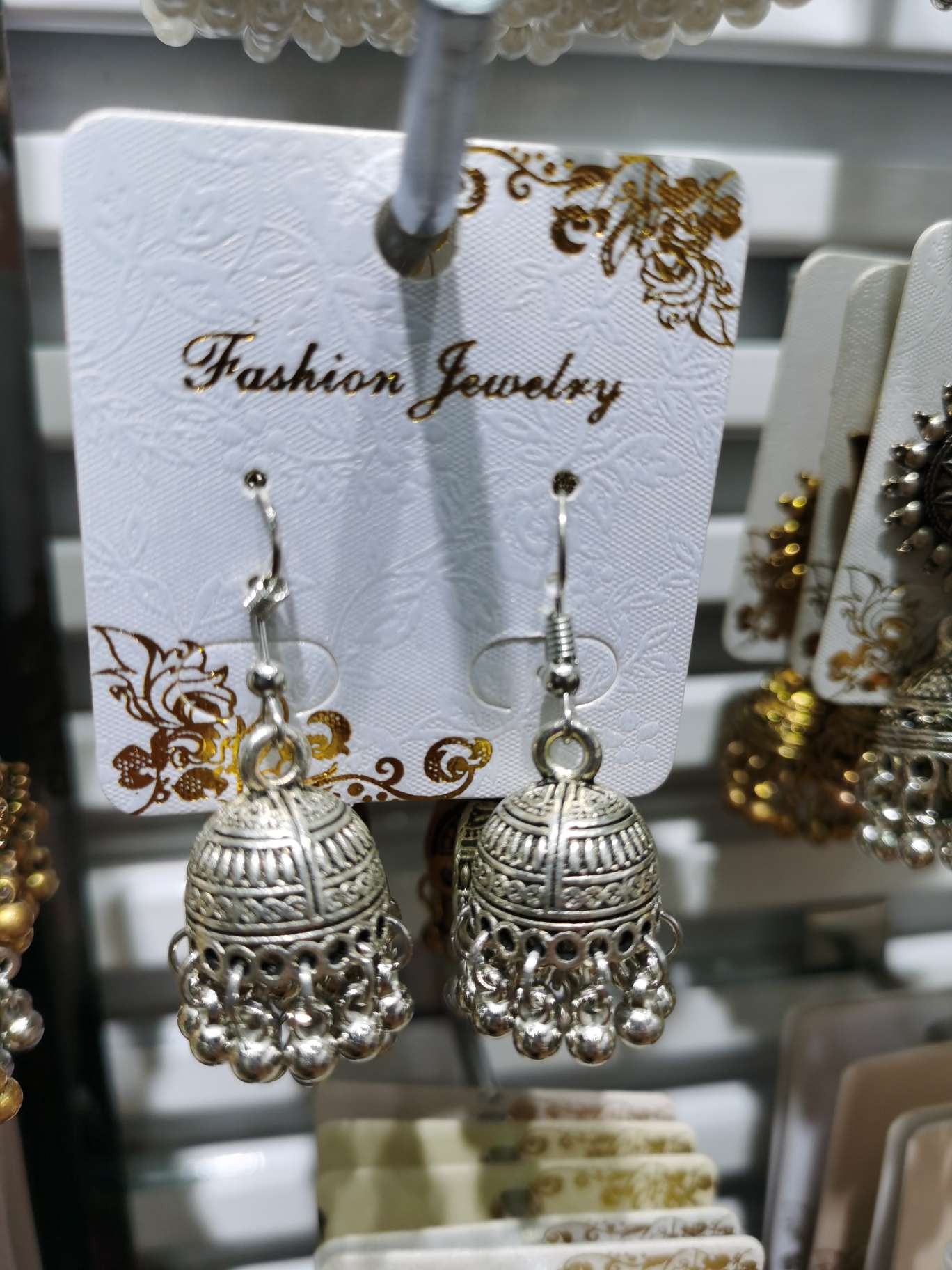 Bell earrings in ancient silver