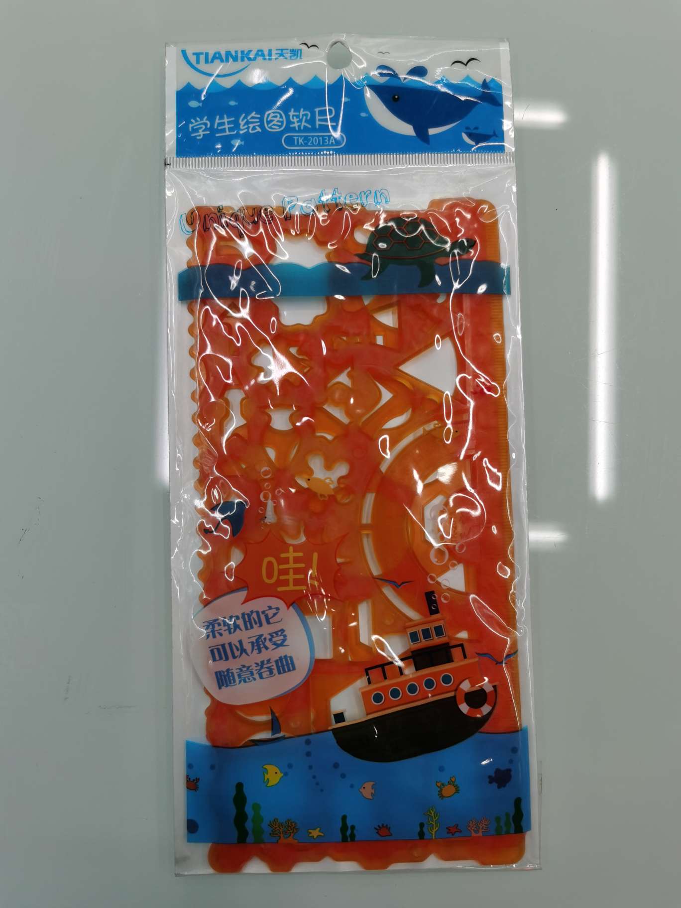 Student drawing flexible ruler 23891