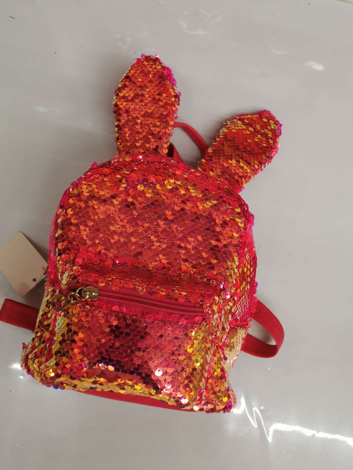 A new laser sequined schoolbag for a little girl