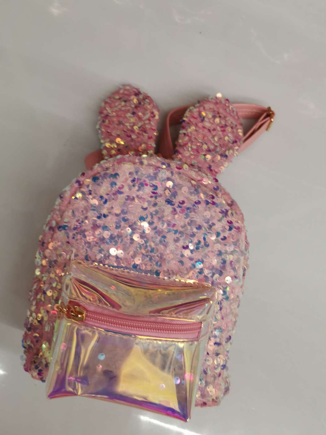 A new sequined rabbit ear schoolbag for a little girl