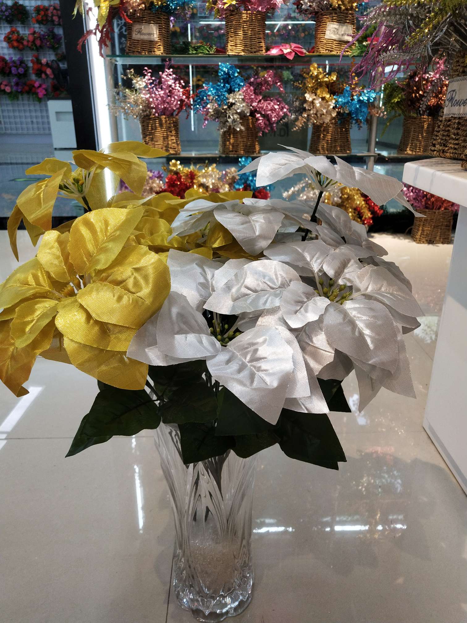 Seven ordinary Christmas flowers made of gold and silver cloth