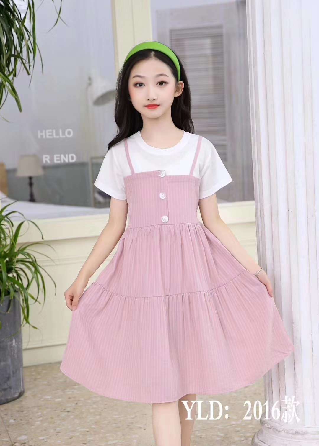 A pink dress with a strap thumbnail