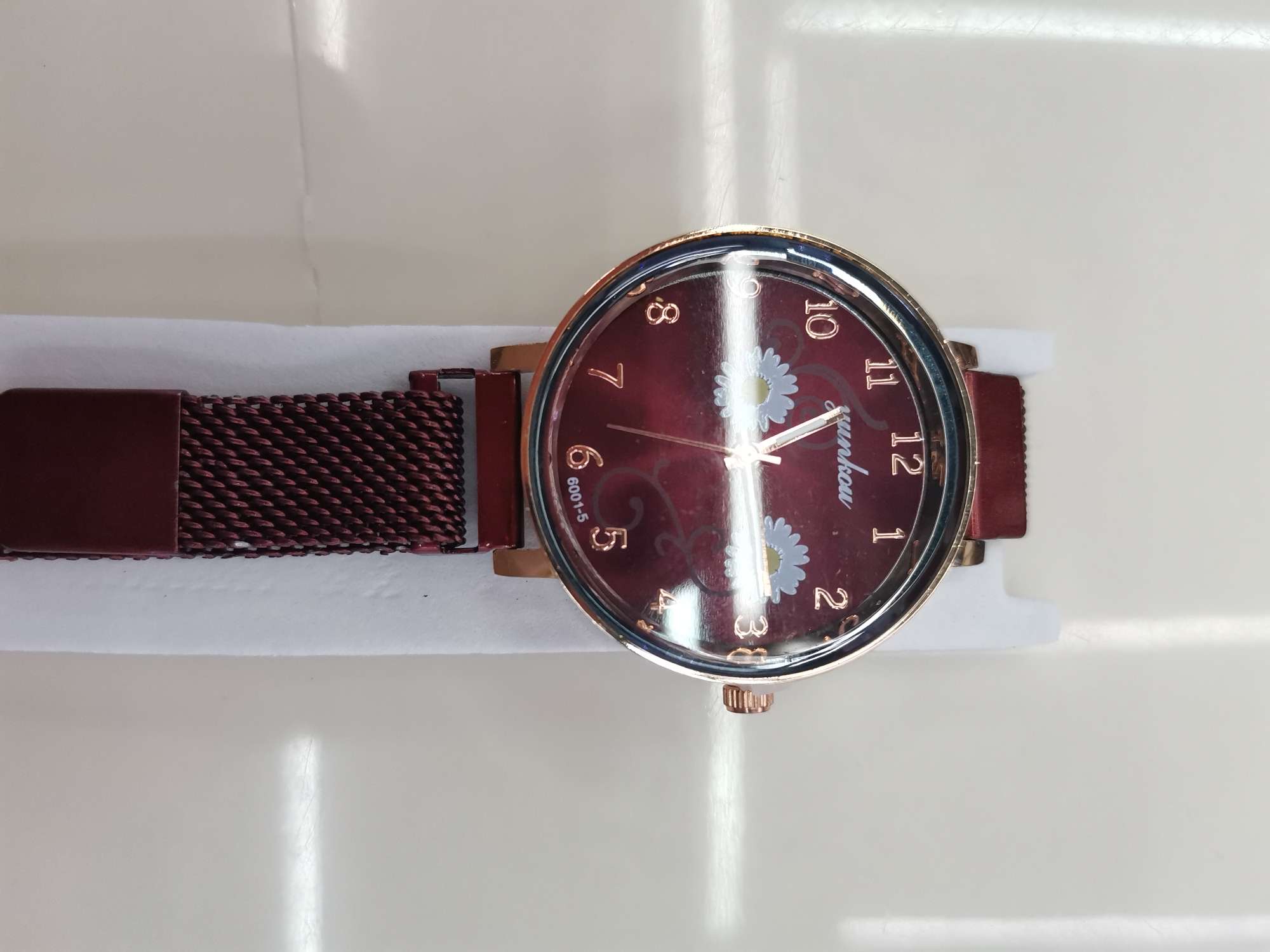 Pequeño reloj daisy