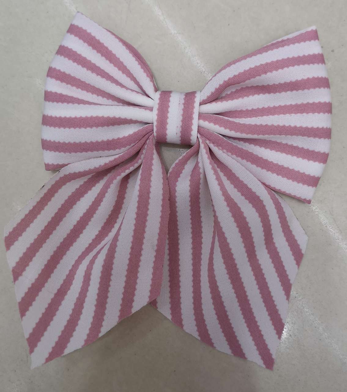 Each bow tie with a flowing tail details Picture