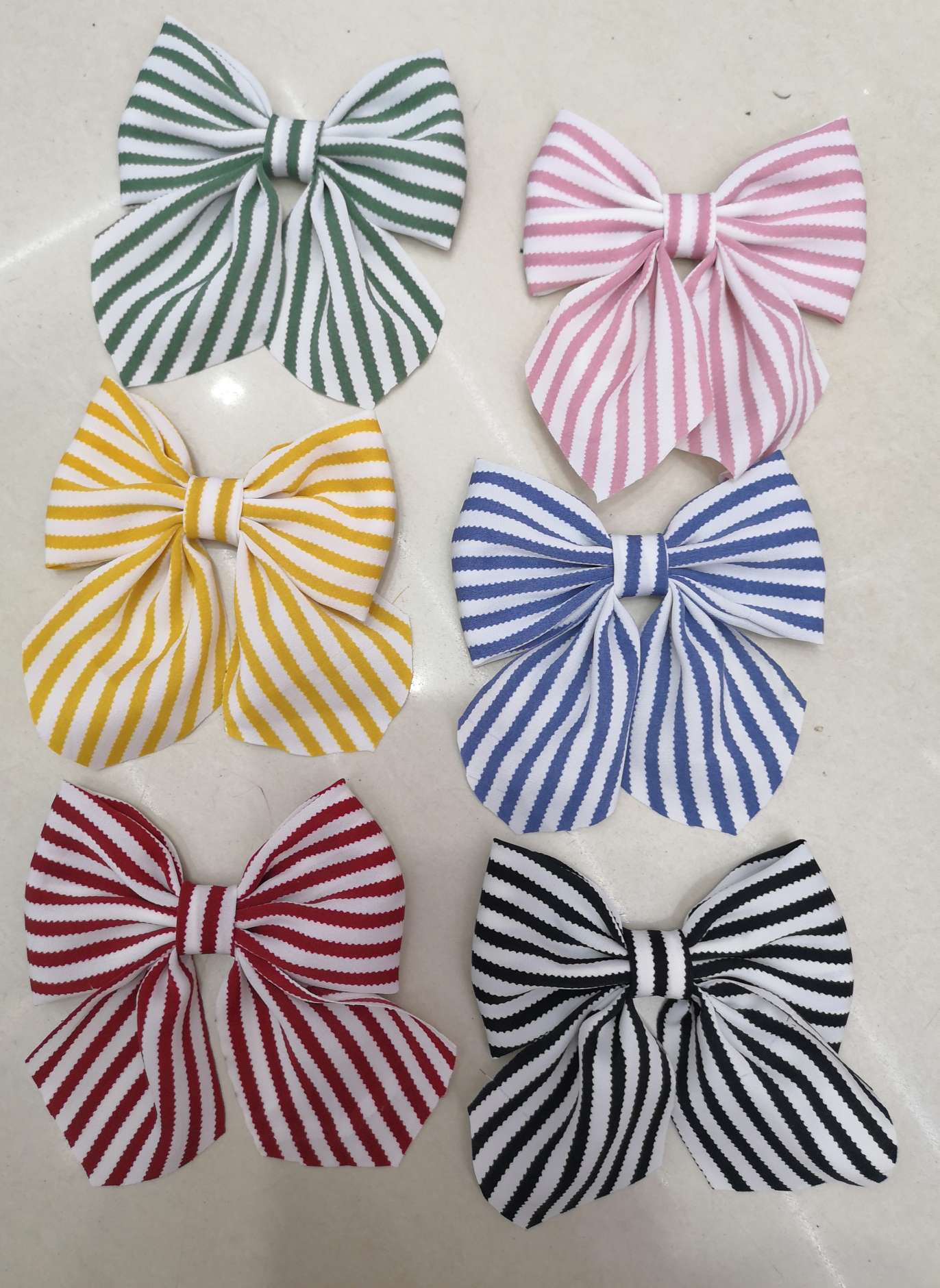 Each bow tie with a flowing tail