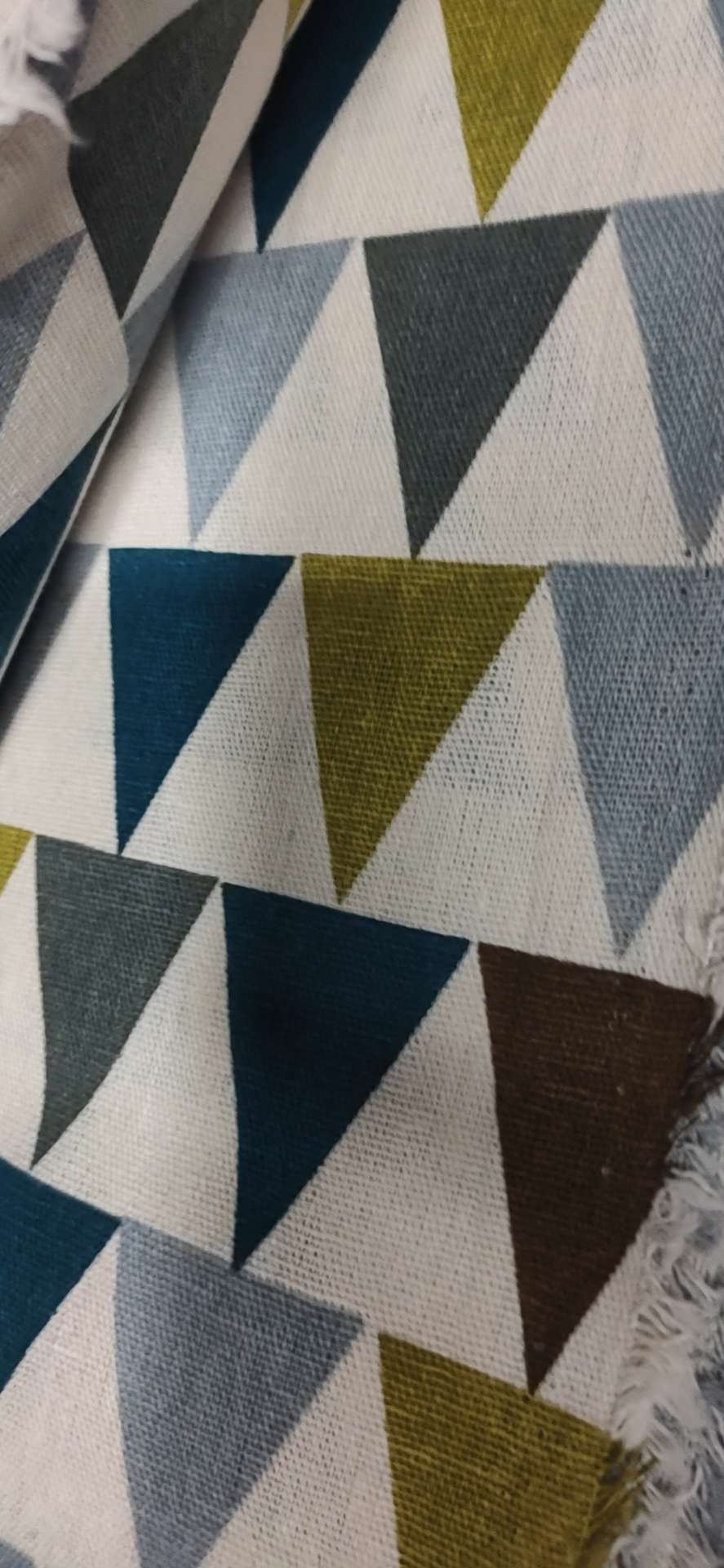 A small sailboat made of cotton and linen printed fabric in its original color details Picture