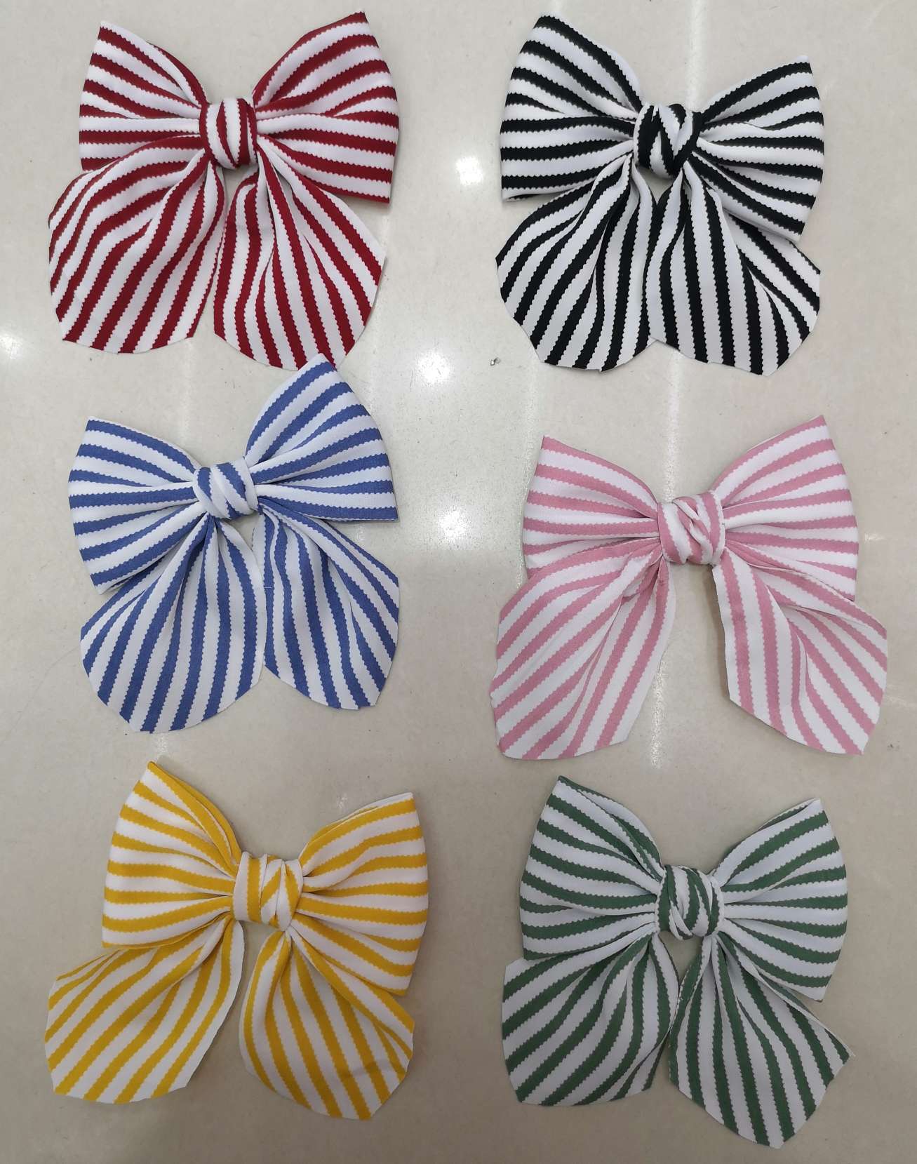 Each of them twisted their bow ties