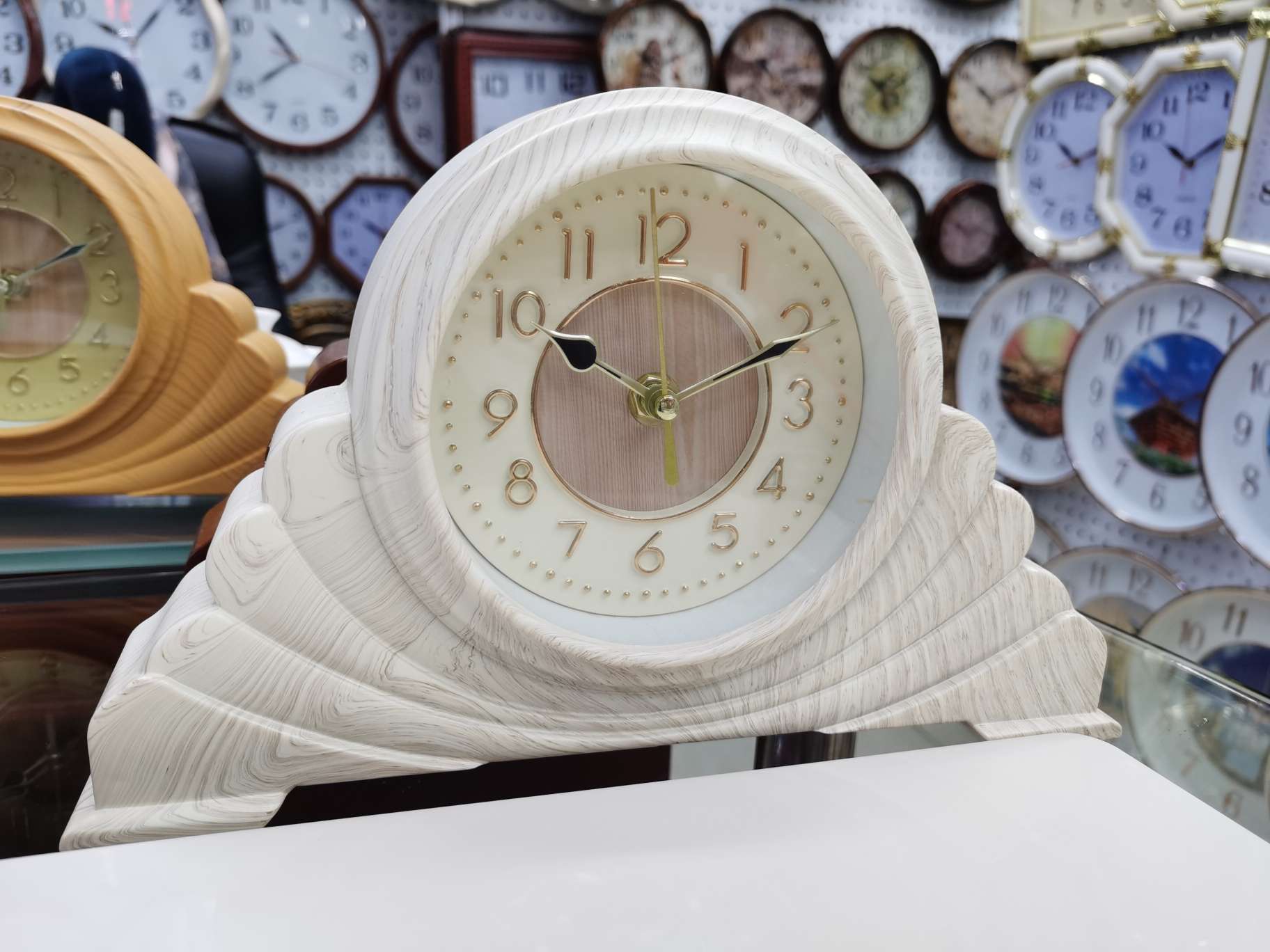 The wall clock is white