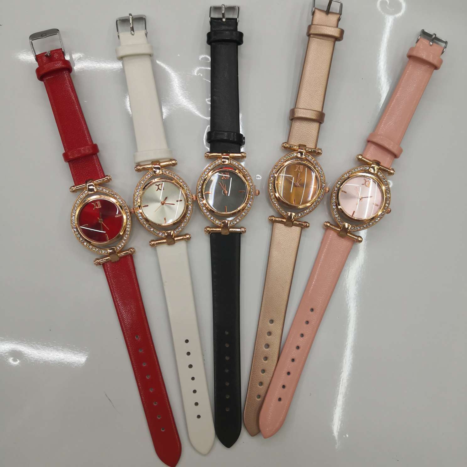 Oval-shaped women's watch with diamonds