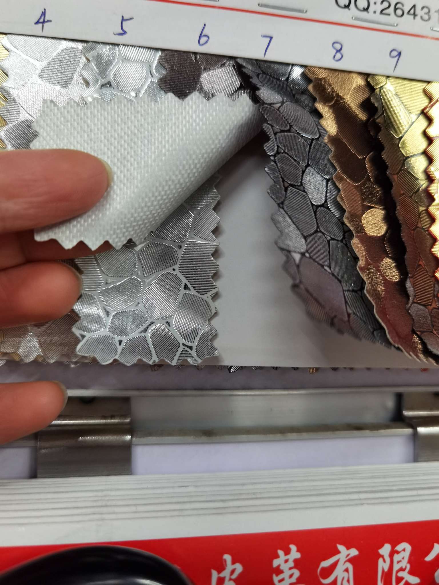 Factory direct sales of small stone-patterned metal leather film printed packaging box fabric detail image 2
