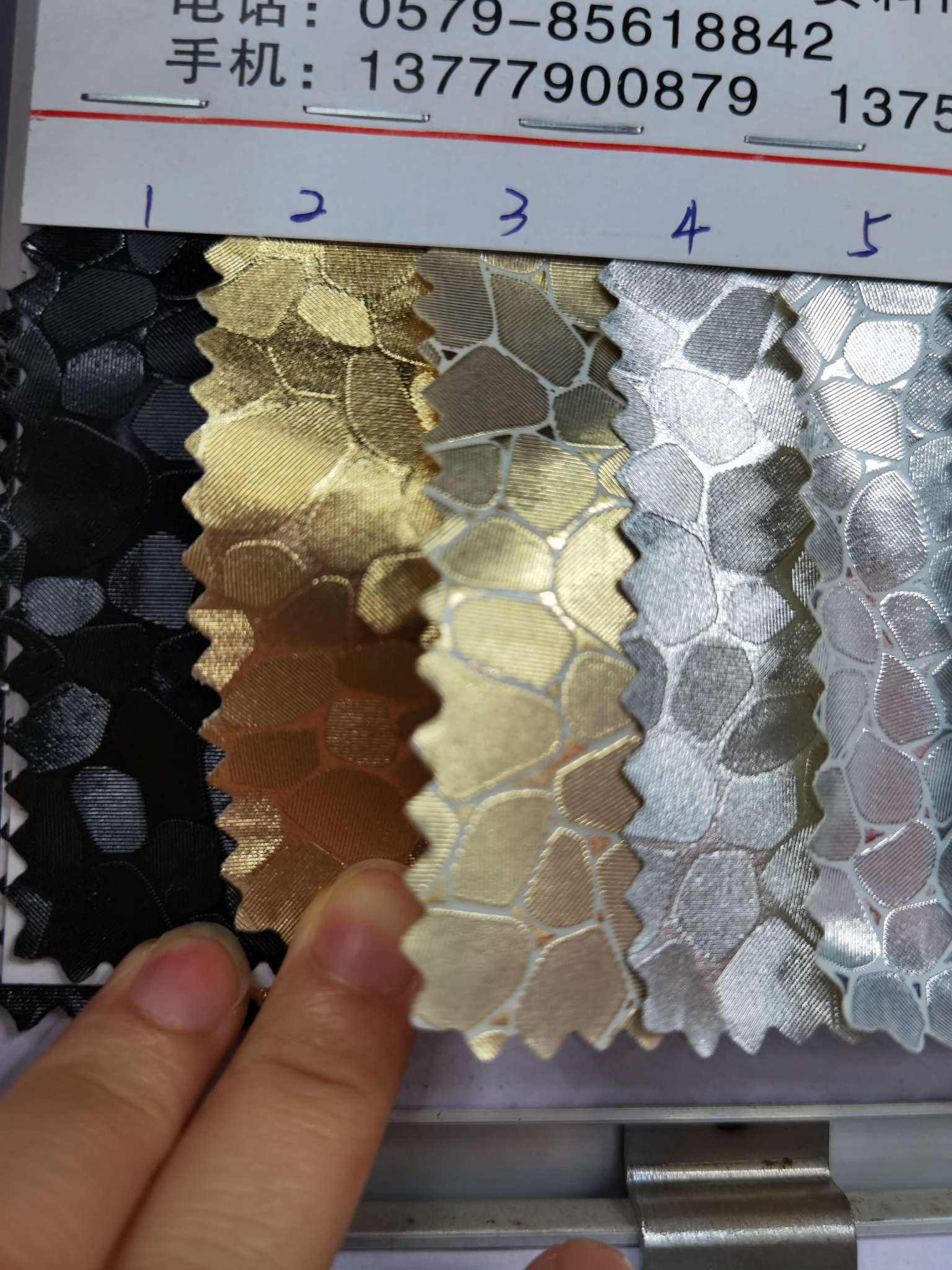 Factory direct sales of small stone-patterned metal leather film printed packaging box fabric