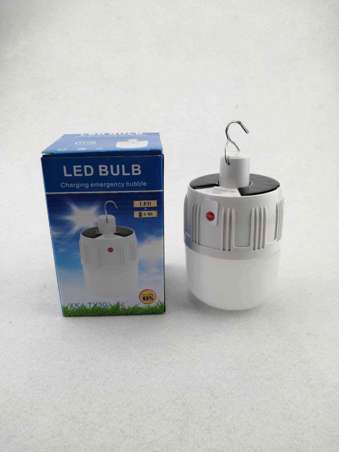 Solar-powered USB charging lamp