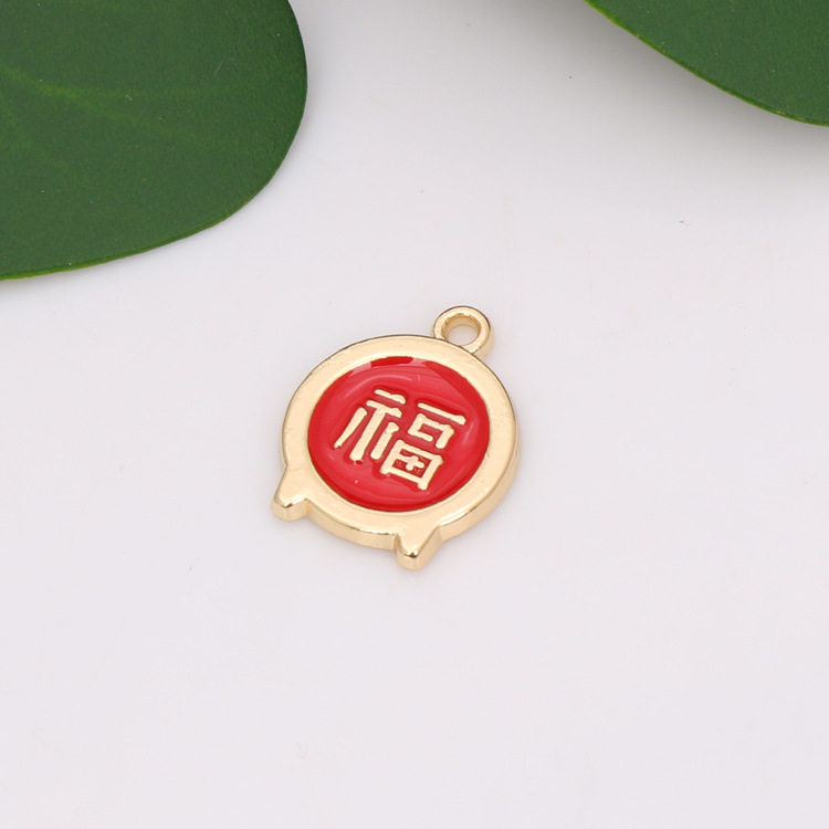 Chinese-style diy jewelry accessories: alloy gold-plated, red oil painting, festive double happiness character, heart-shaped "Fu" character earrings and pendants Item Picture