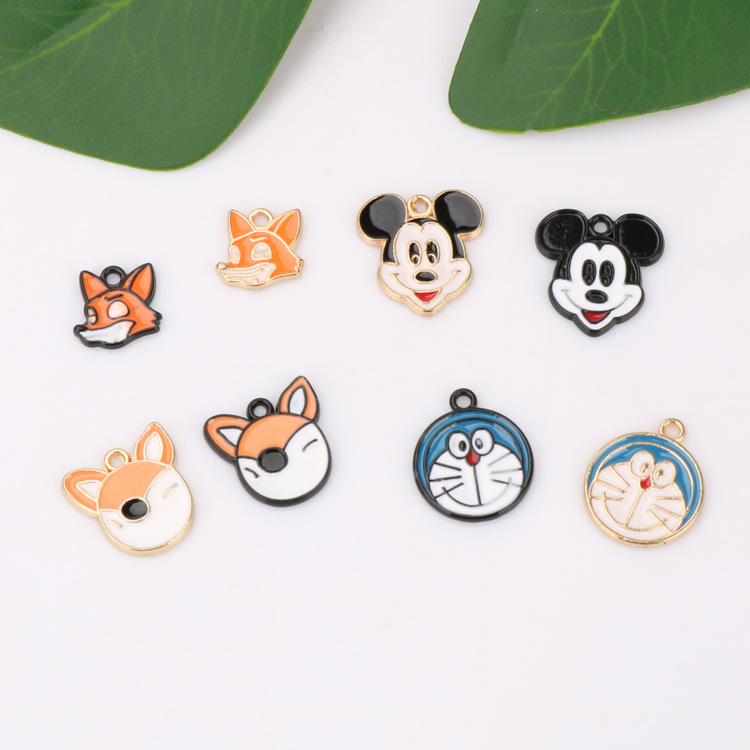 Creative ins Cute Girl and Boy Cartoon Fun Series KC Golden oil-dripping Alloy Small Pendant bracelet Pendant