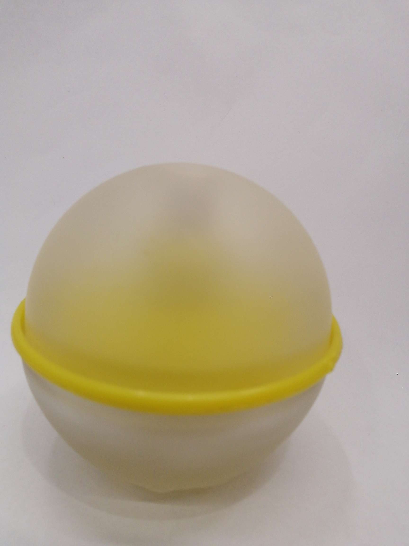 Perfume bottle is white and transparent