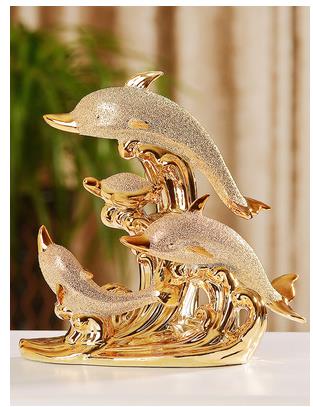 陶瓷金色海豚工艺品是家居的摆设