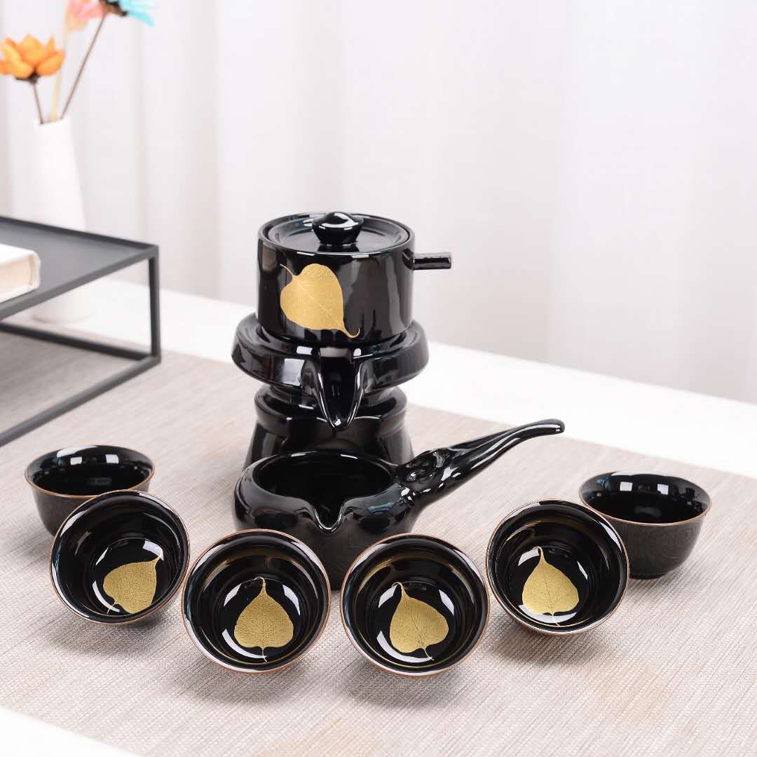 Ceramic wood leaf marigold automatic tea set