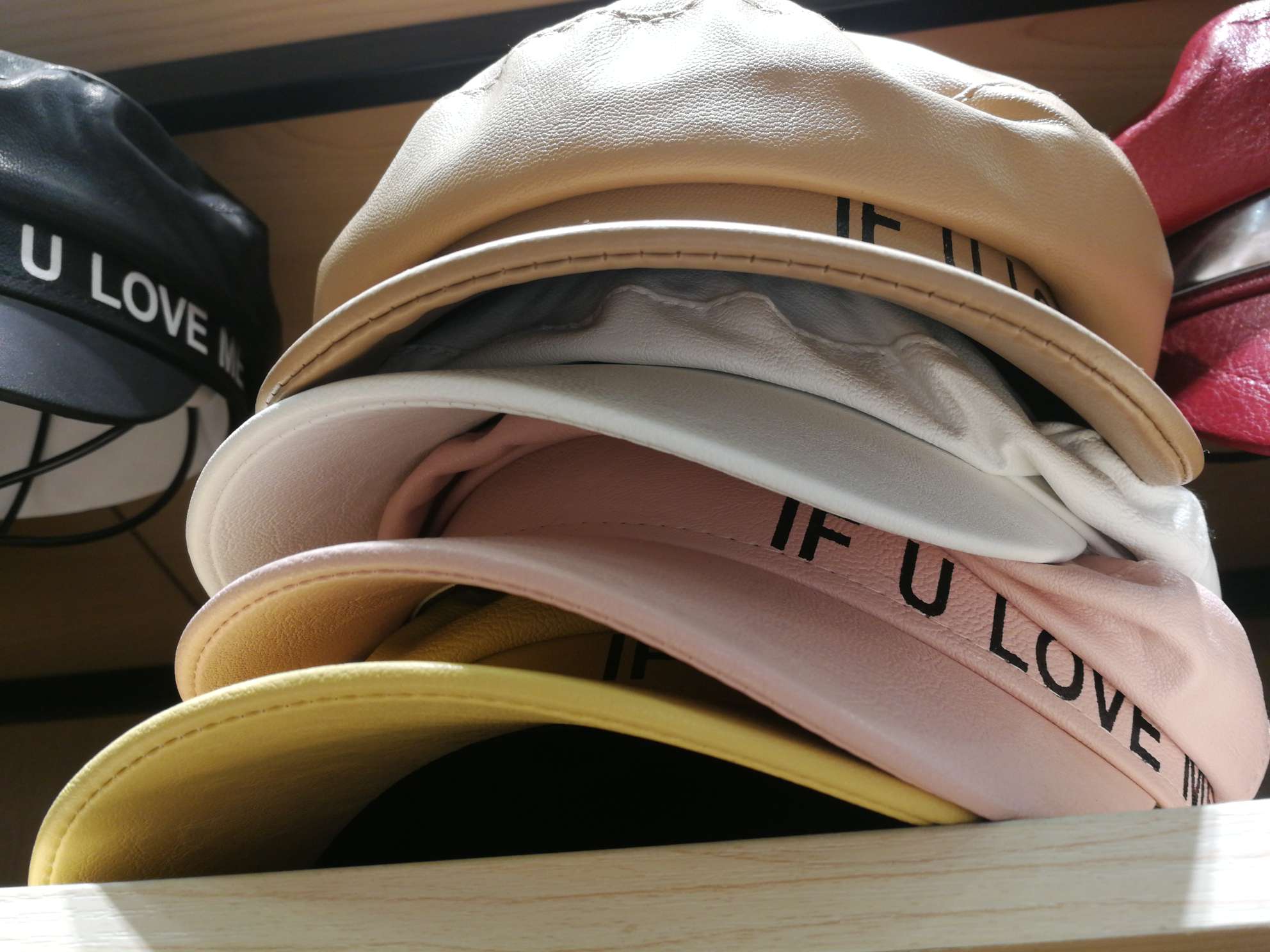 The leather military cap is printed with letters details Picture