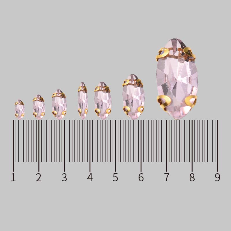 批发D形玻璃爪钻 5*10mm马眼耳朵爪钻 白色 手缝玻璃爪钻 DIY服饰配件细节图