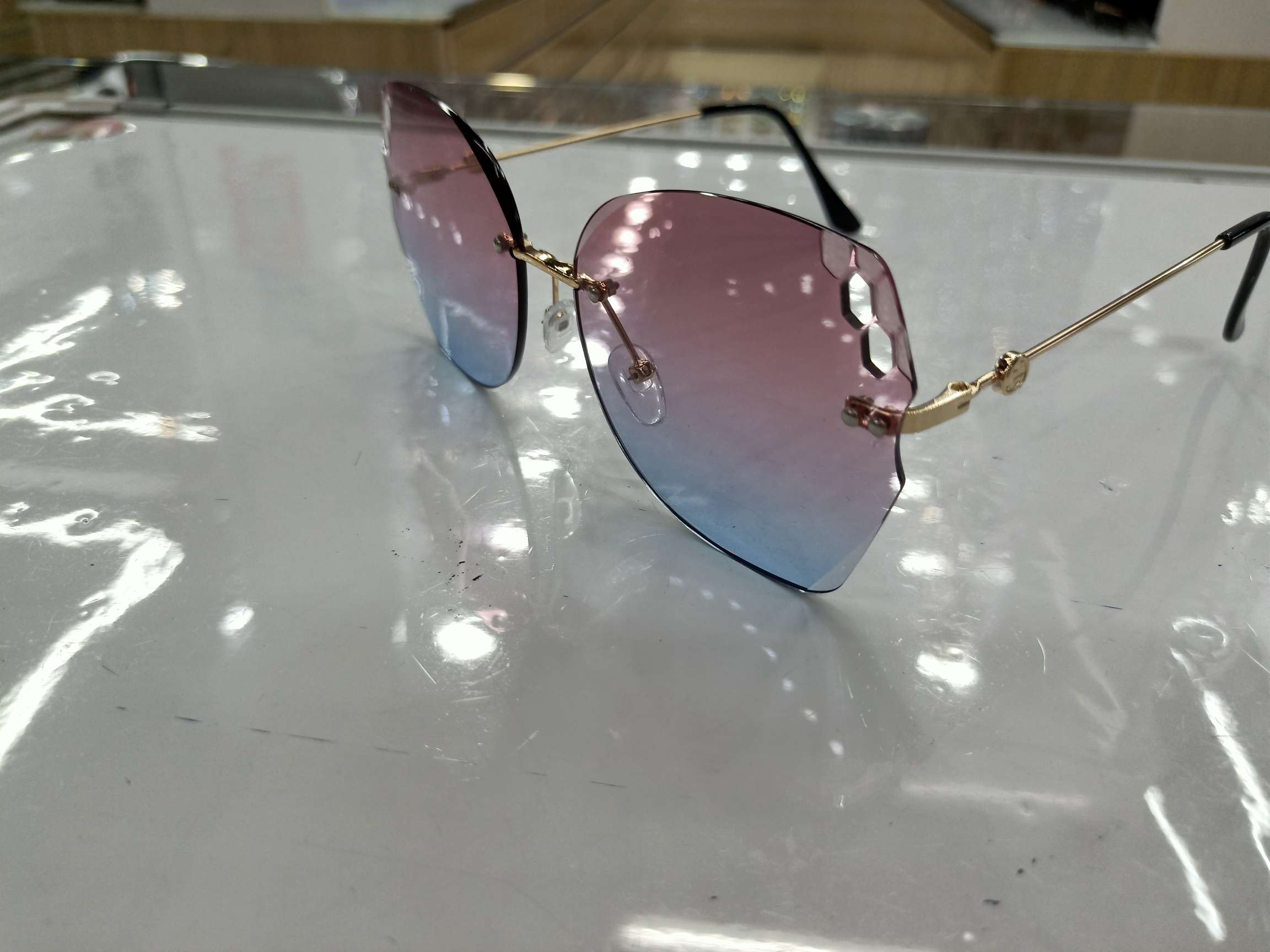 2020 Korean version internet-famous sunglasses Round face UV protection frameless sunglasses Women's Korean version trendy small face glasses 8054 Specification image