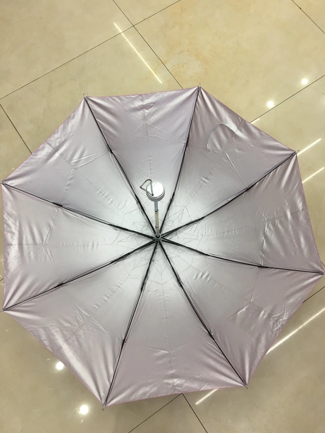 The 8-bone three-fold umbrella, a creative outdoor couple umbrella for rain and sun protection, is a bestseller in foreign trade detail image 2