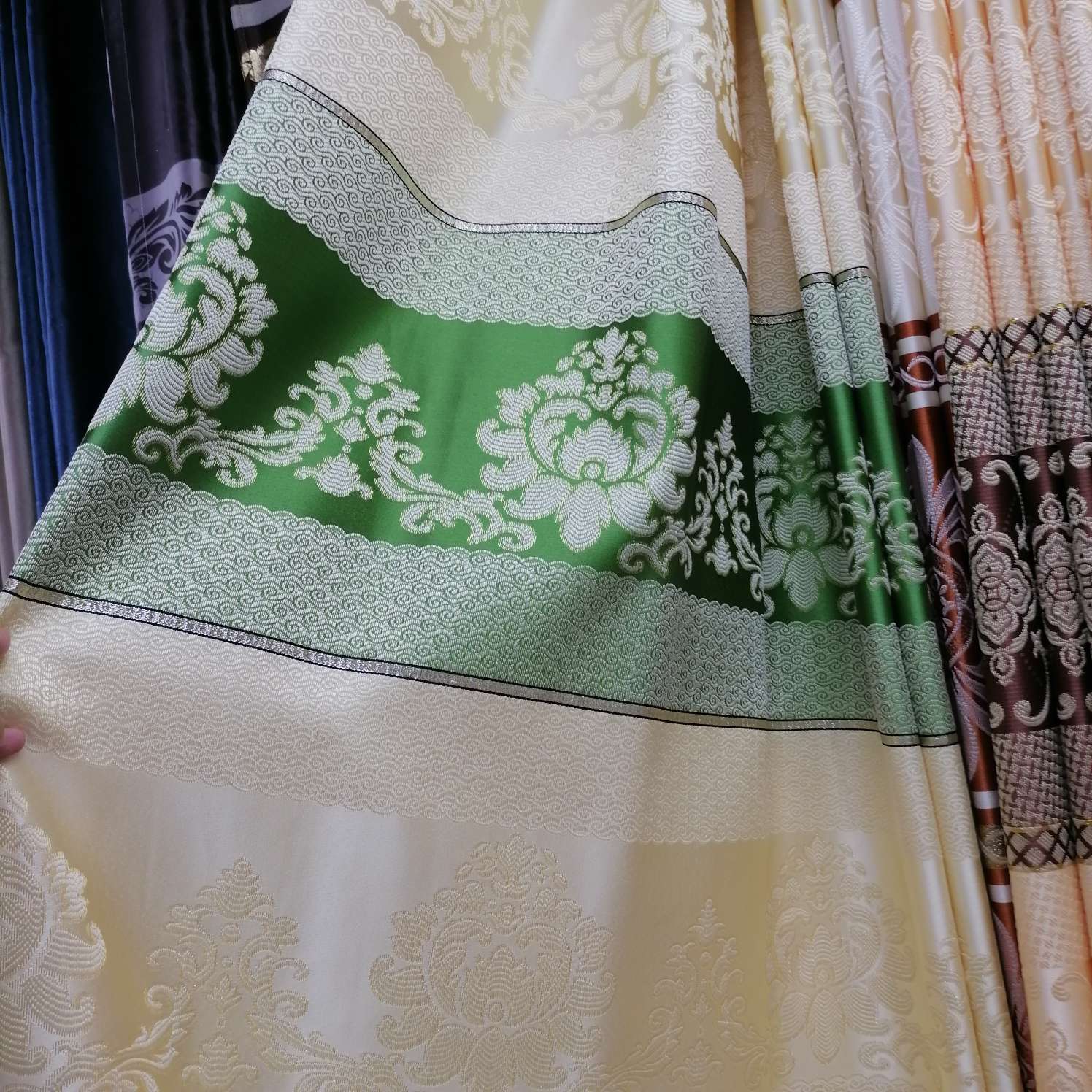 The curtain fabric is green and yellow