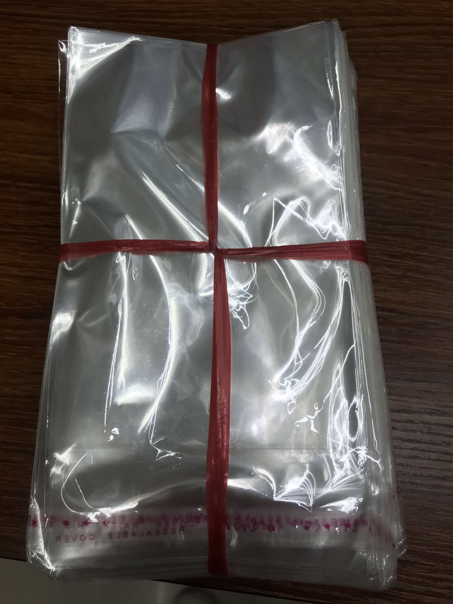 يلتصق ذاتيا 28 ✘ 43 أكياس شفافة OPP الحقيبة BuGanJiao OPP أكياس من نصبوا حقيبتين من النوع الذي يلتصق ذاتيا الملابس للأكياس البلاستيكية LOGO المطبوعة