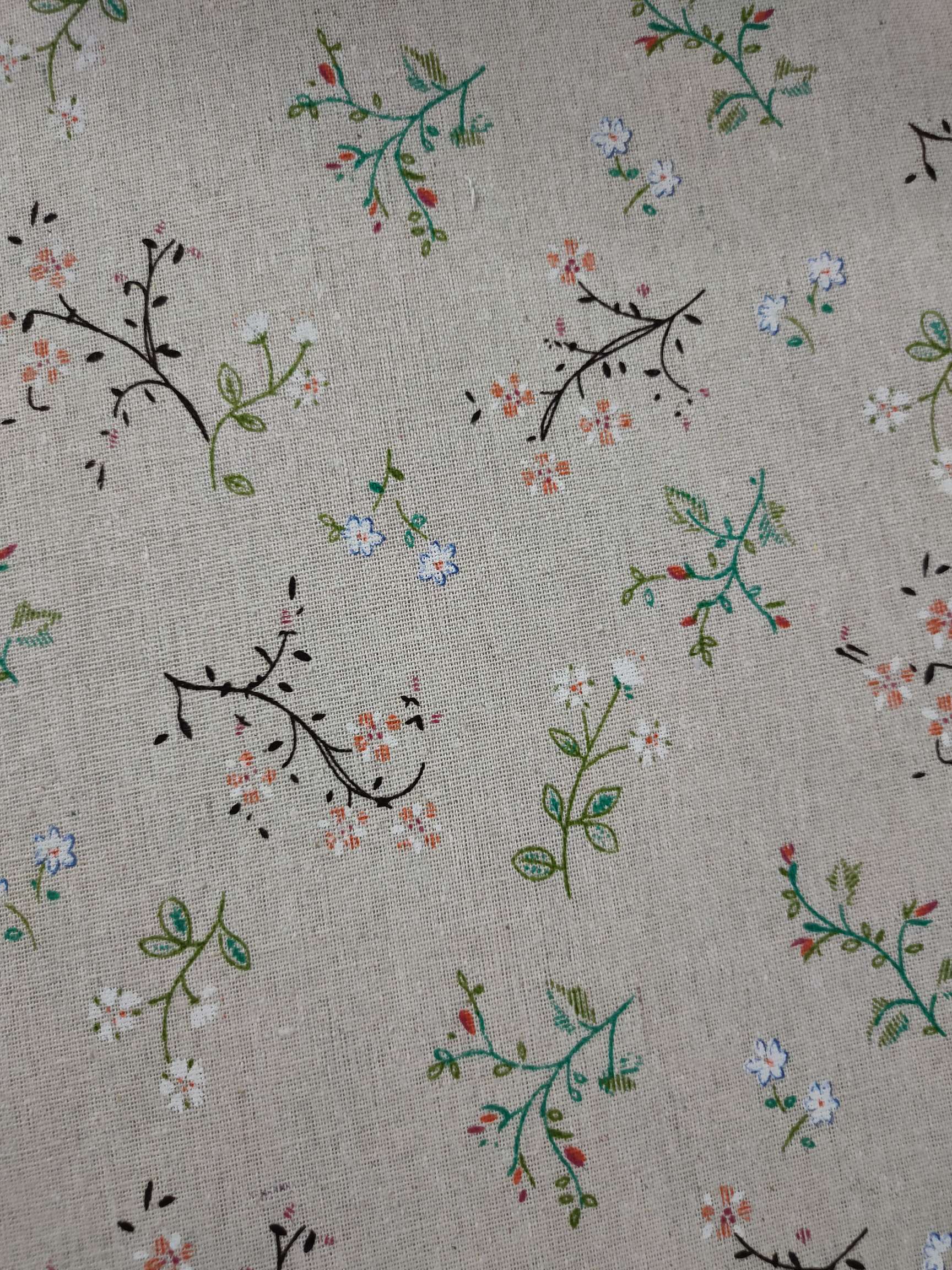 棉麻印花绿大棕叶白底实物图