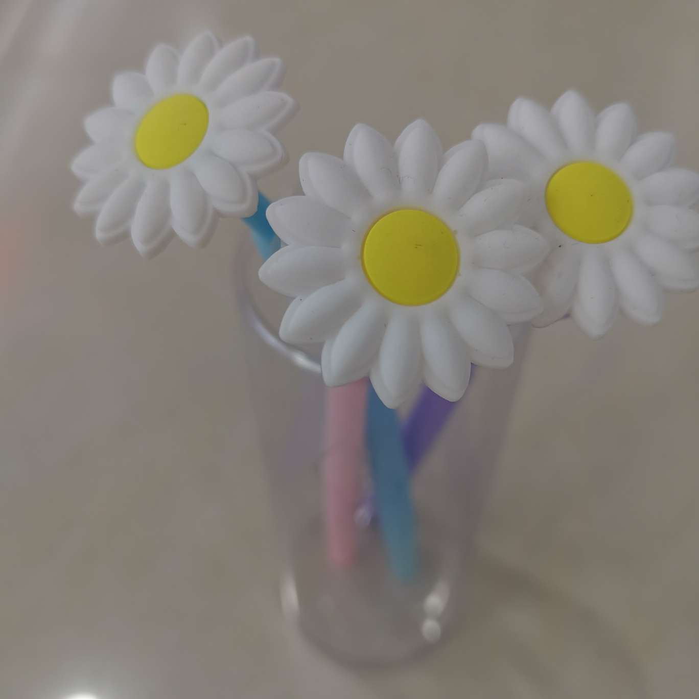 A small daisy-shaped soft rubber pen detail image 1