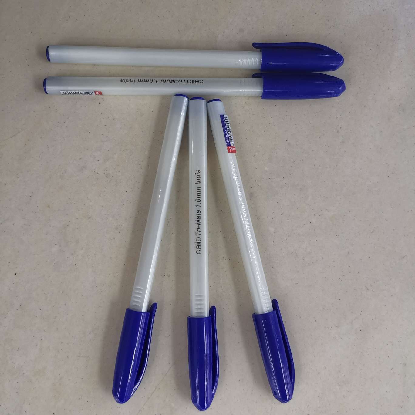 A simple blue-capped ballpoint pen detail image 3