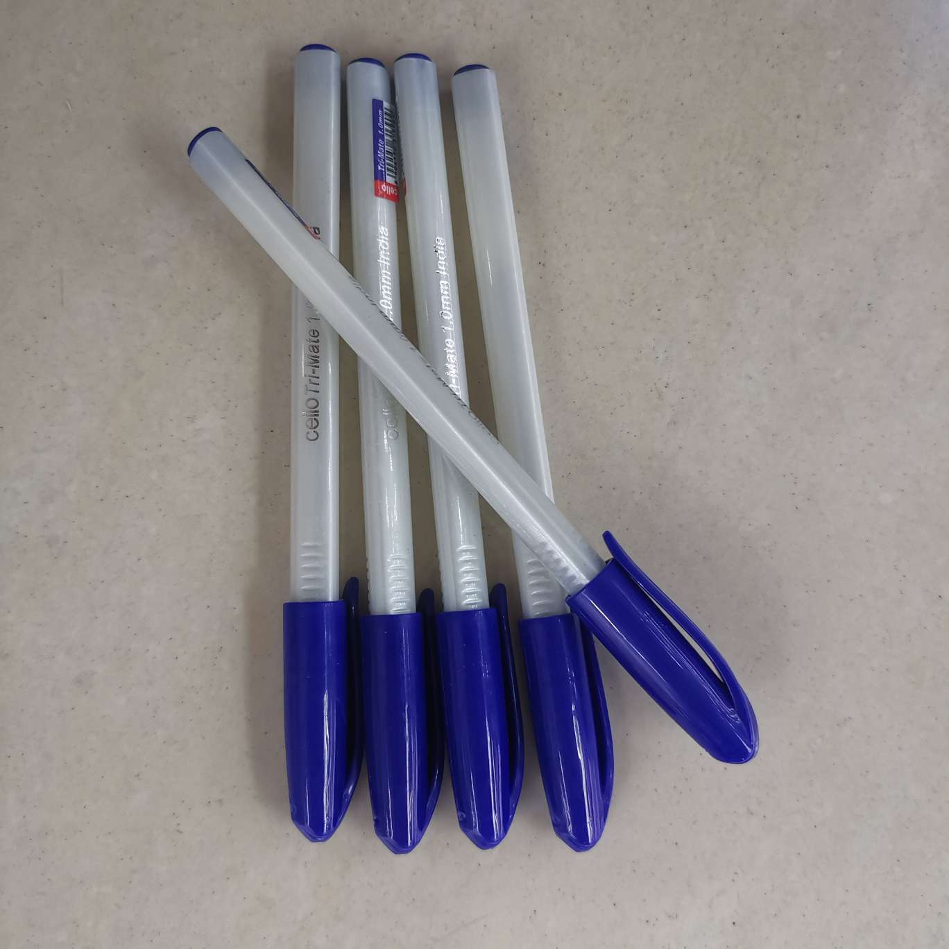 A simple blue-capped ballpoint pen detail image 1