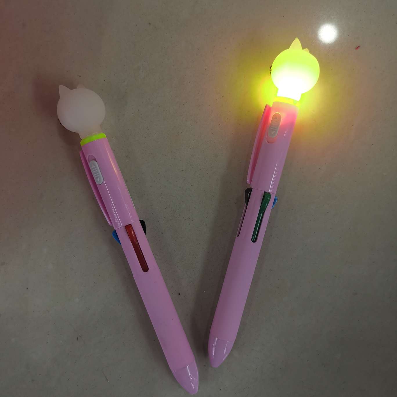 Four-color ballpoint pen with light