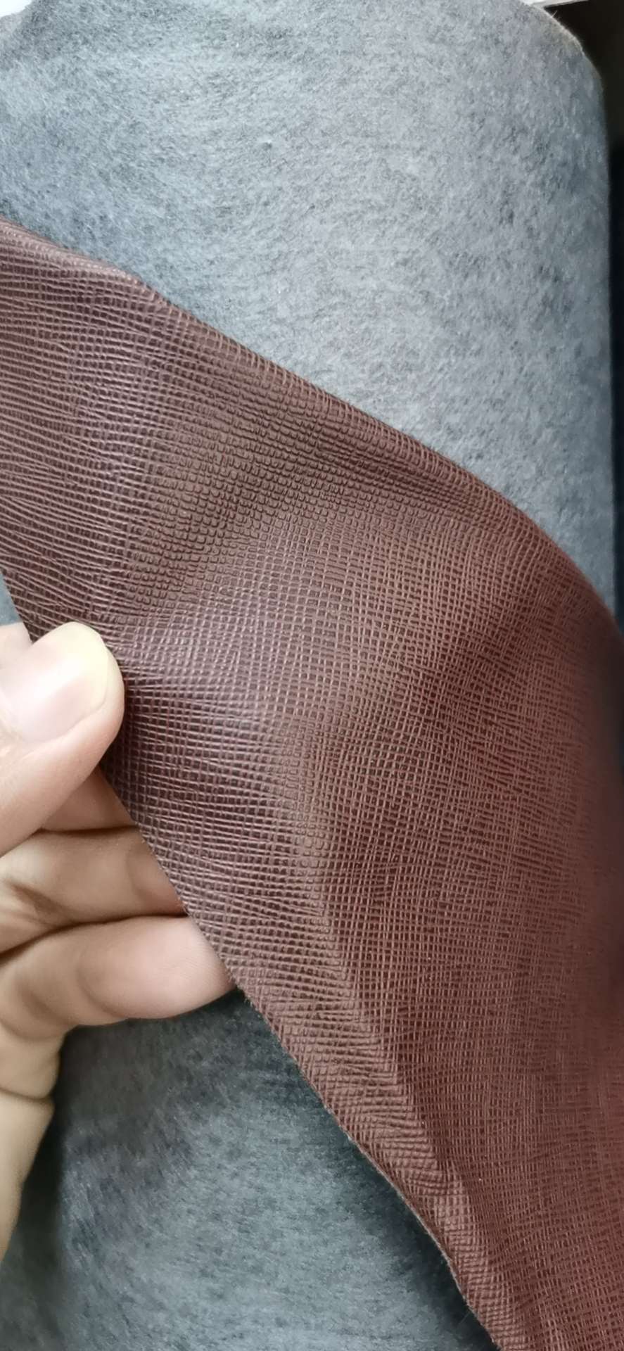 pvc spunlace bottom cross-patterned leather bag packaging 7