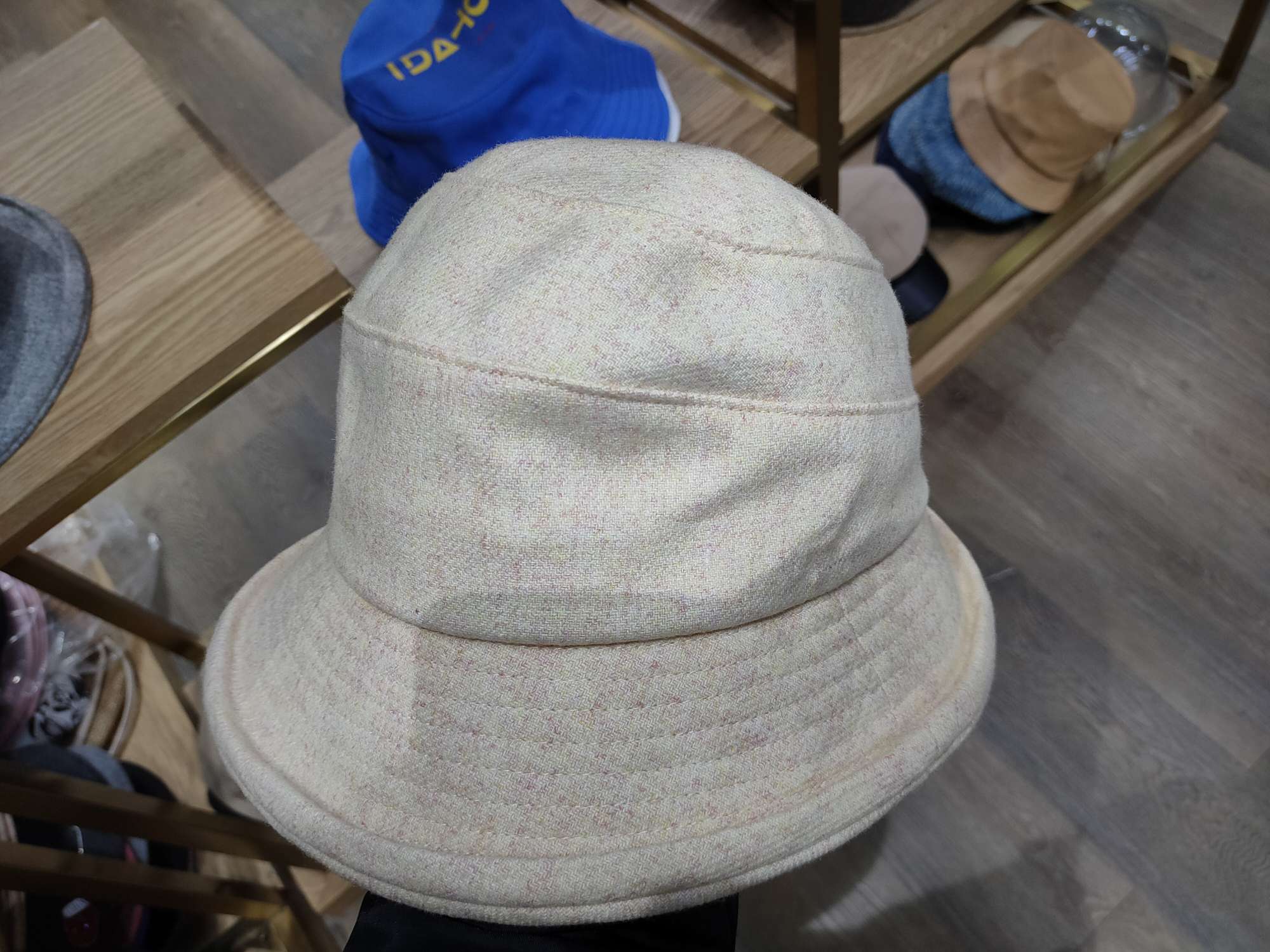 The plain hat is beige Specification image