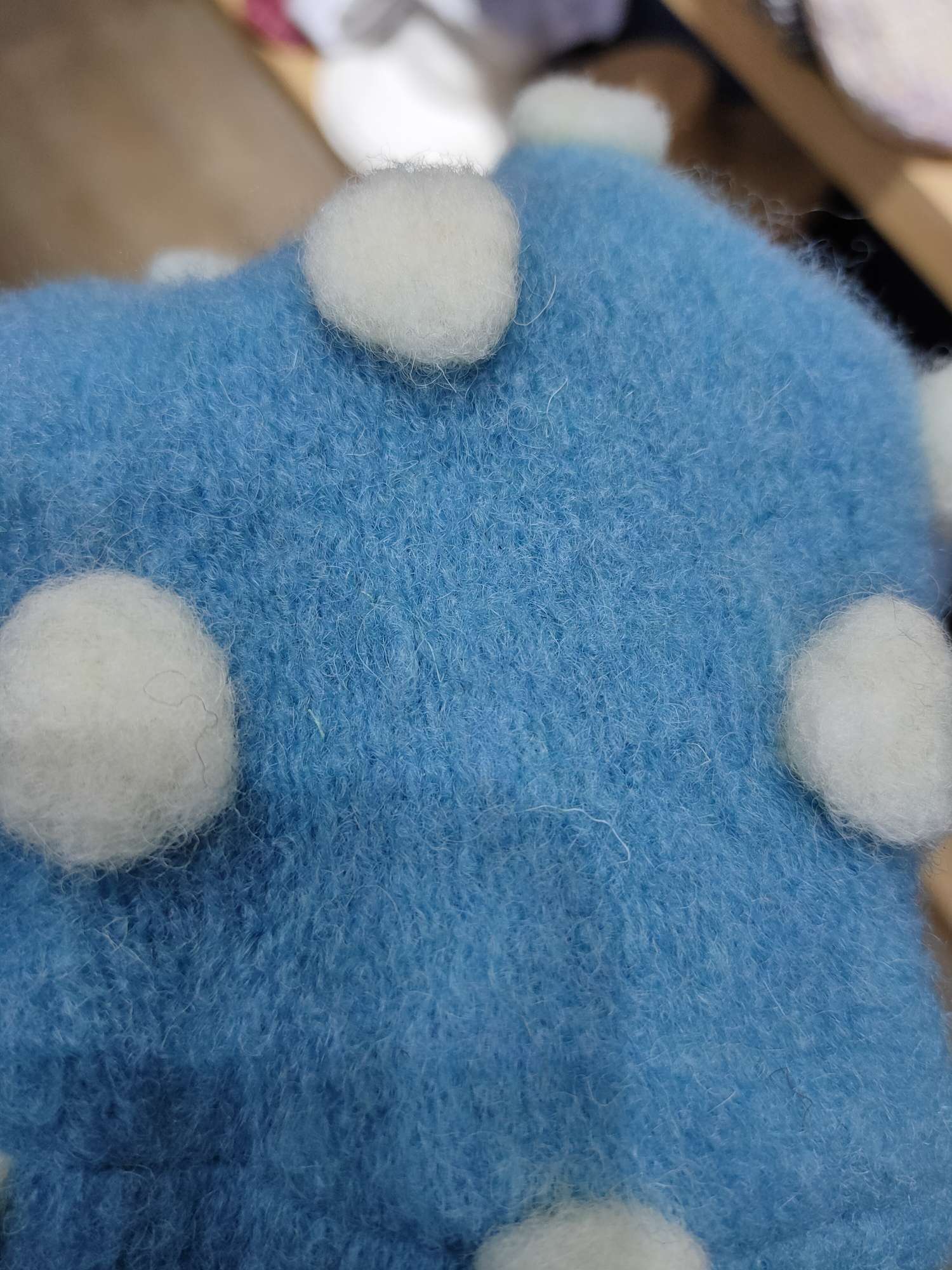 Cashmere ball bud hat detail image 2