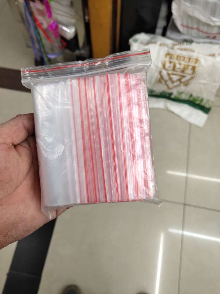 Self-sealing bag 23